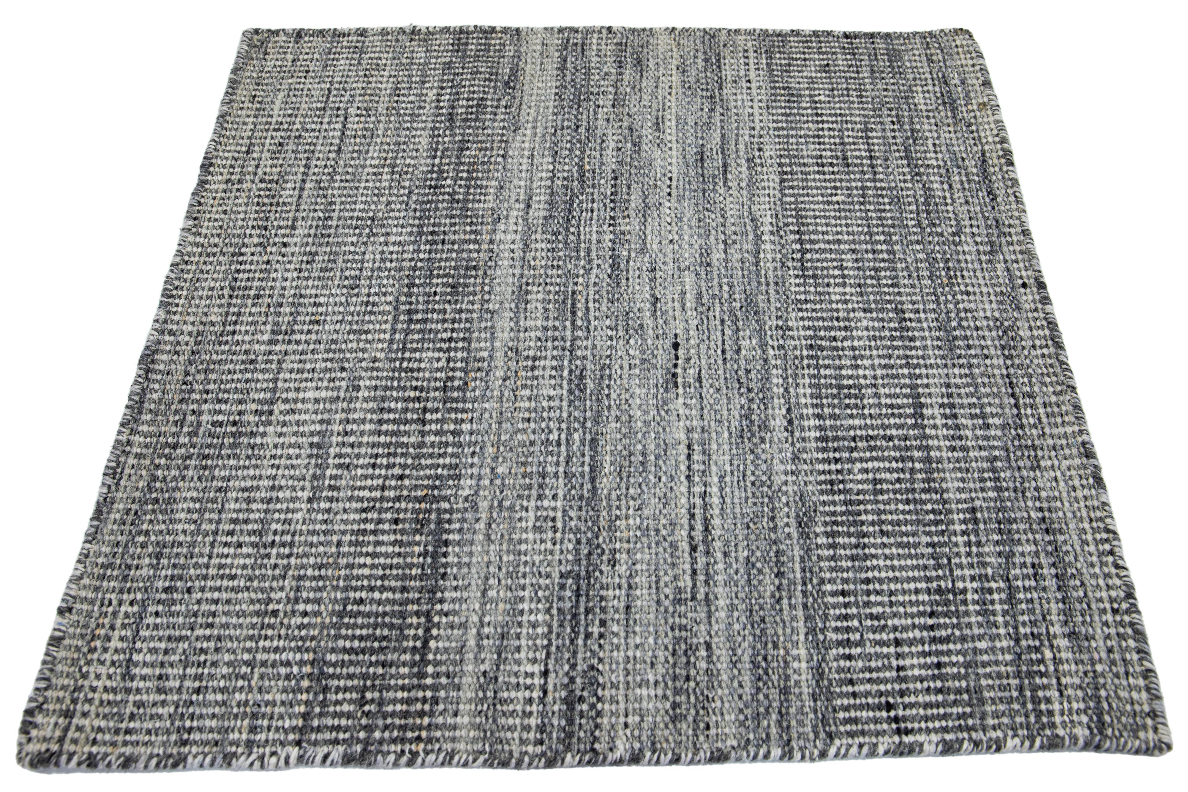 Apadana's Kilim Flatweave wool custom rug. Custom sizes and colors made-to-order.

Material: Wool.
Techniques: Flatweave.
Style: Solid-Coastal.
Lead time: Approx. 15-16 weeks available.
Colors: As shown, other custom colors are