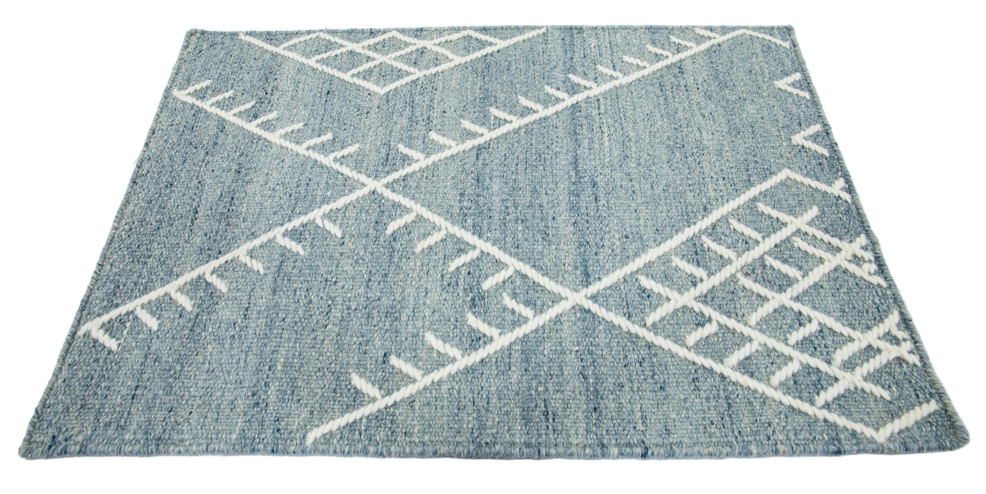 Apadana's Nantucket Collection wool custom rug. Custom sizes and colors made-to-order. 

Material: Wool 
Techniques: Flatweave
Style: Geometric-Coastal
Lead time: Approx. 15-16 wks available 
Colors: As shown, other custom colors are