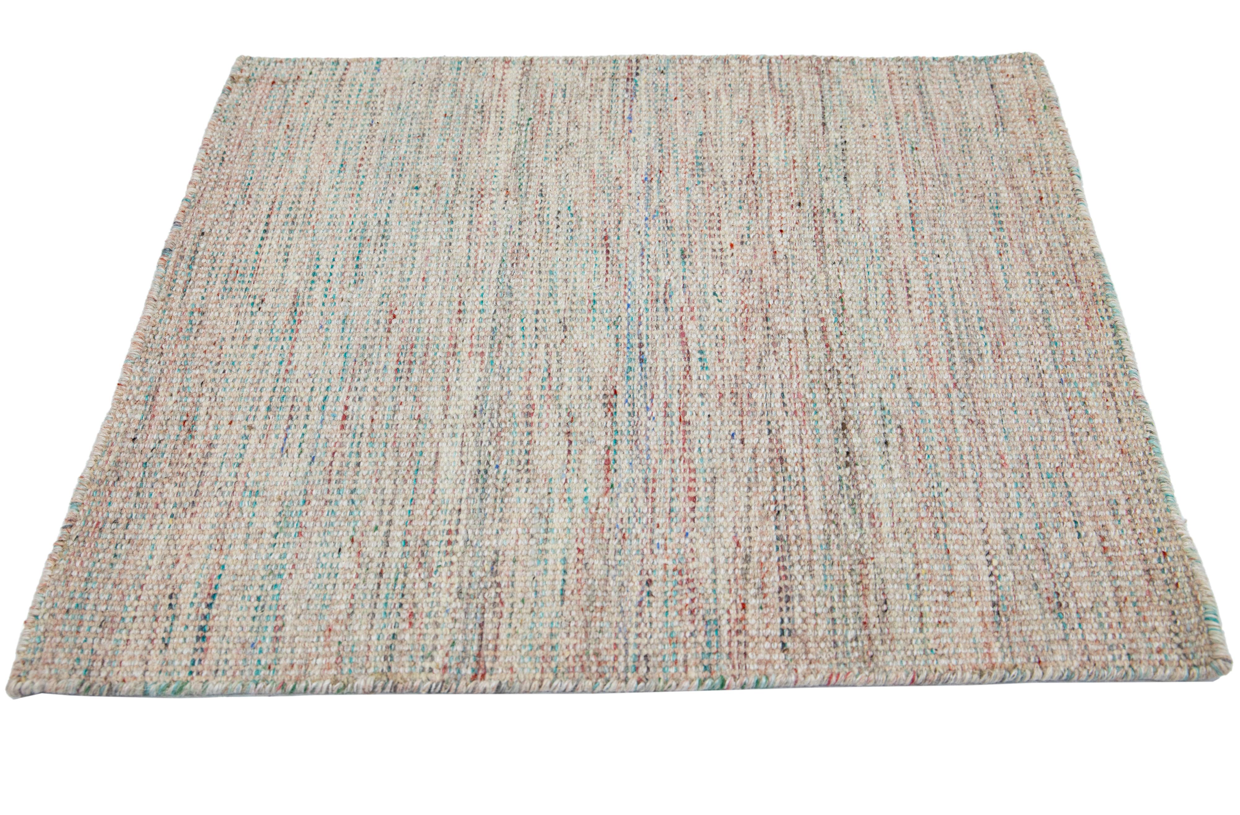 Apadana's Kilim Flatweave wool custom rug. Custom sizes and colors made-to-order.

Material: Wool.
Techniques: Flatweave.
Style: Solid-Coastal.
Lead time: Approx. 15-16 weeks available.
Colors: As shown, other custom colors are available.
Origen: