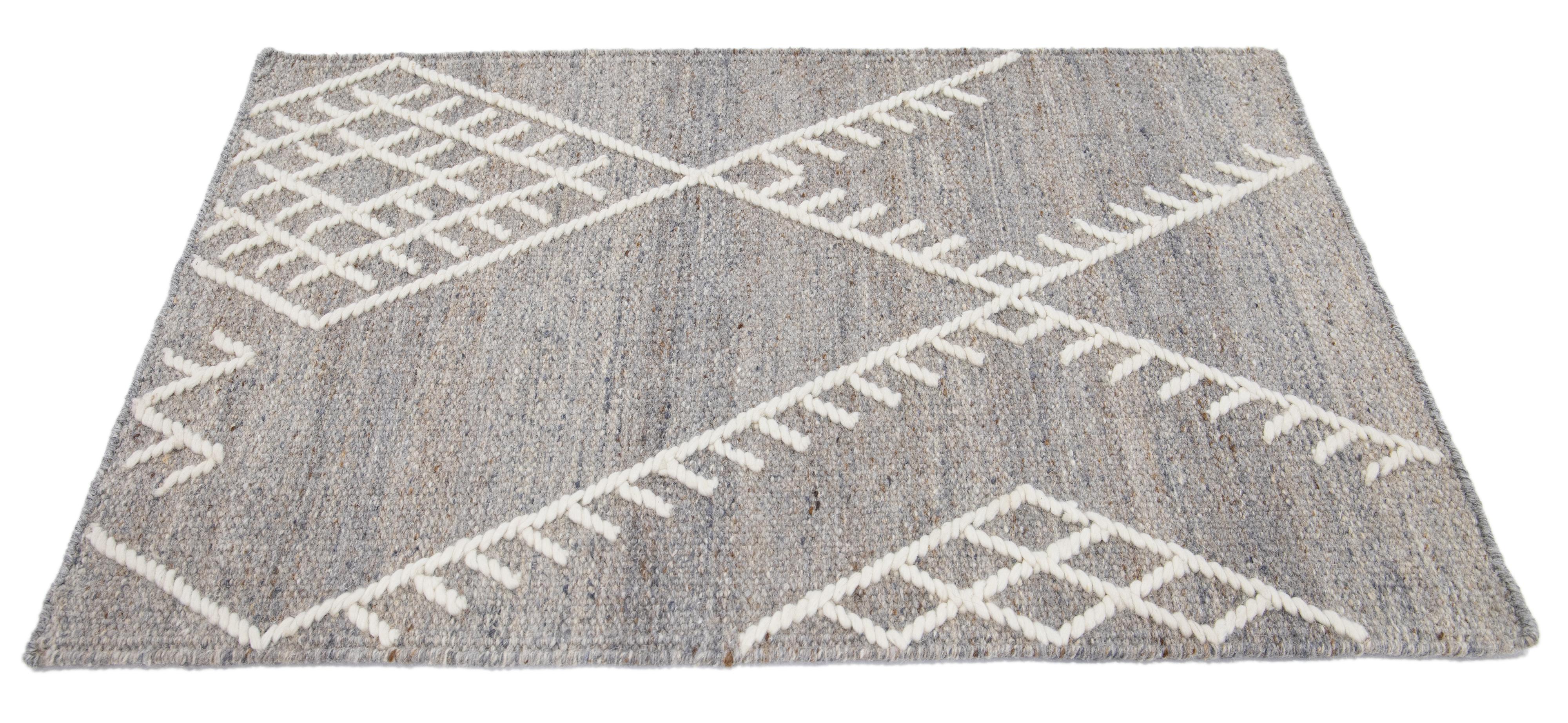 Apadana's Nantucket Collection wool custom rug. Custom sizes and colors made-to-order. 

Material: Wool 
Techniques: Flatweave
Style: Geometric-Coastal
Lead time: Approx. 15-16 wks available 
Colors: As shown, other custom colors are