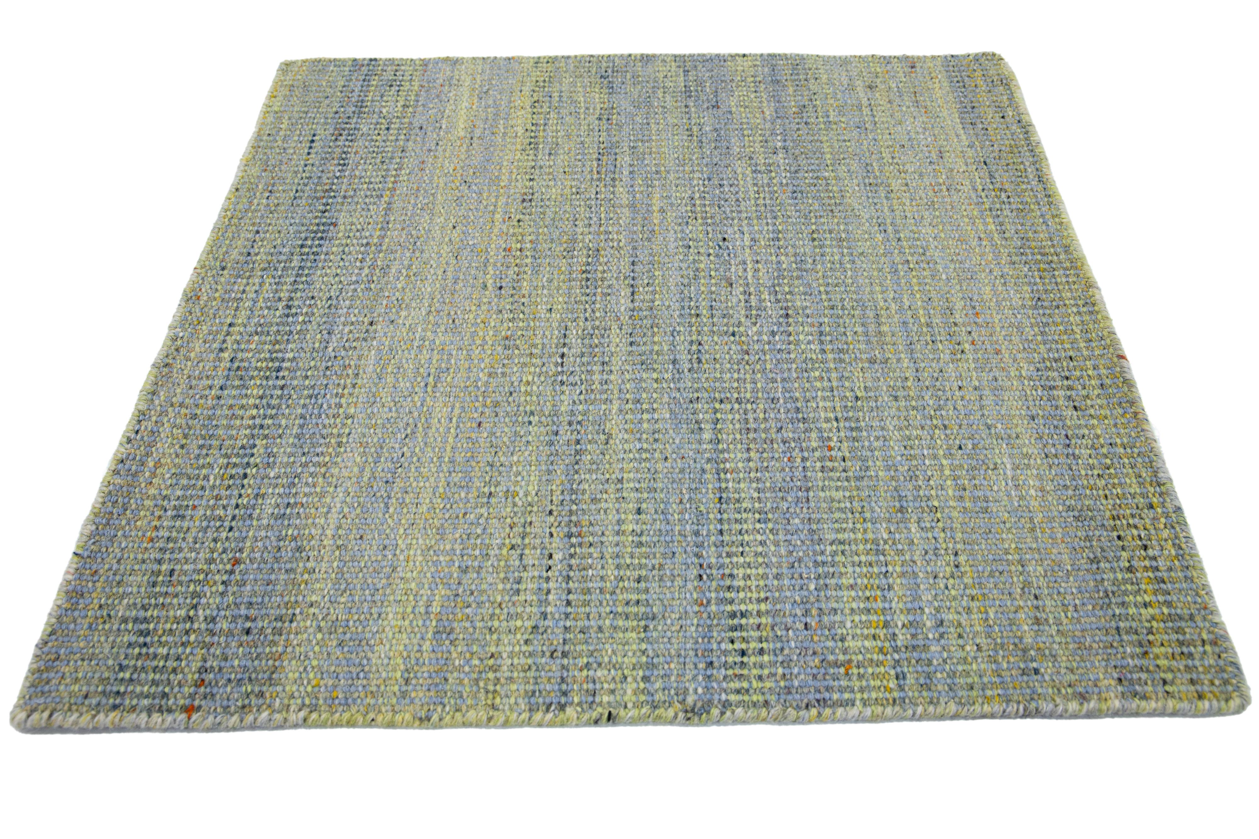 Apadana's Kilim Flatweave wool custom rug. Custom sizes and colors made-to-order.

Material: Wool.
Techniques: Flatweave.
Style: Solid-Coastal.
Lead time: Approx. 15-16 weeks available.
Colors: As shown, other custom colors are