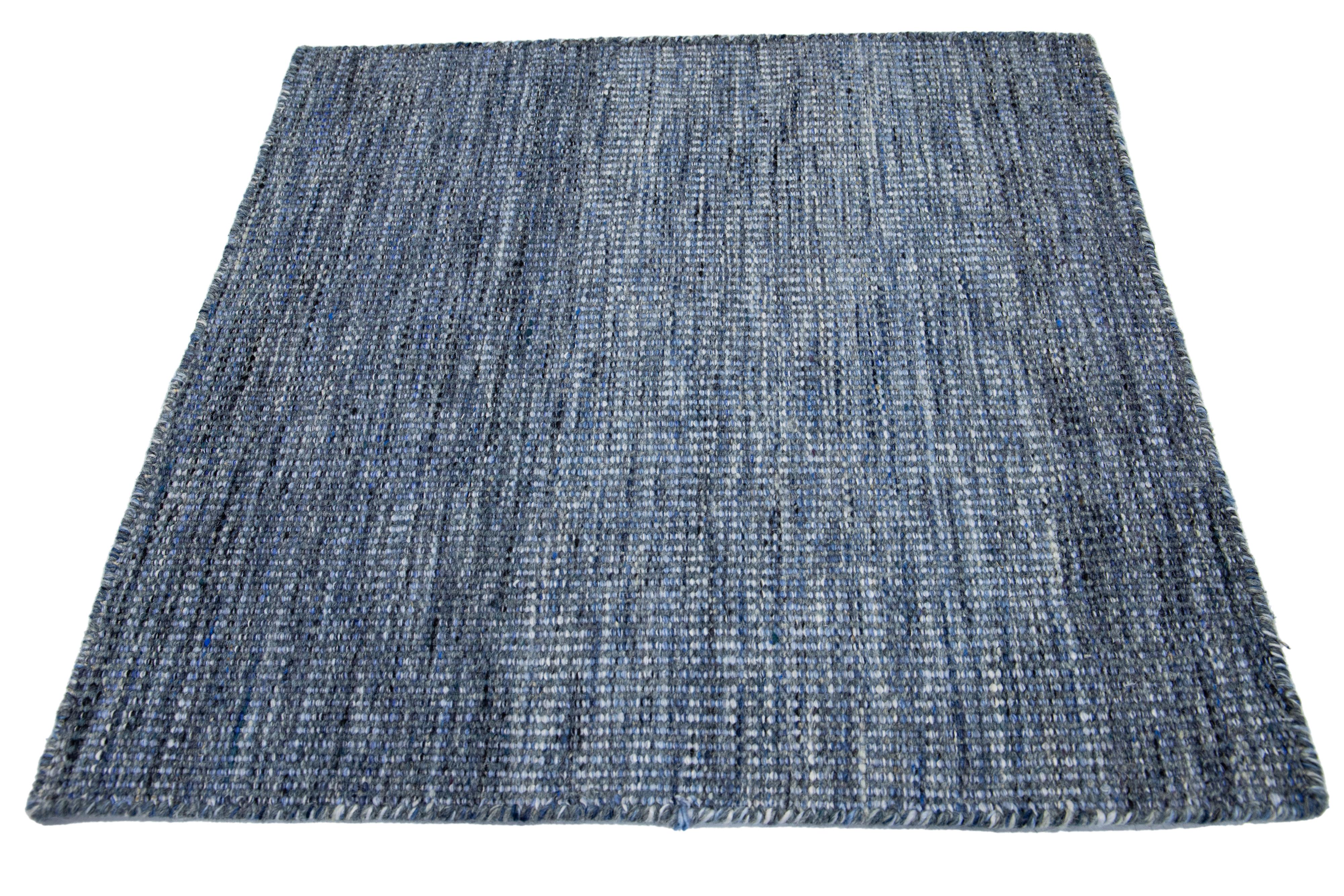 Apadana's Kilim Flatweave wool custom rug. Custom sizes and colors made-to-order.

Material: Wool.
Techniques: Flatweave.
Style: Solid-Coastal.
Lead time: Approx. 15-16 weeks available.
Colors: As shown, other custom colors are