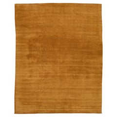 Apadana's Modern Gabbeh Hand-Loom Wool Area Rug In Earthy Yellow-Orange.