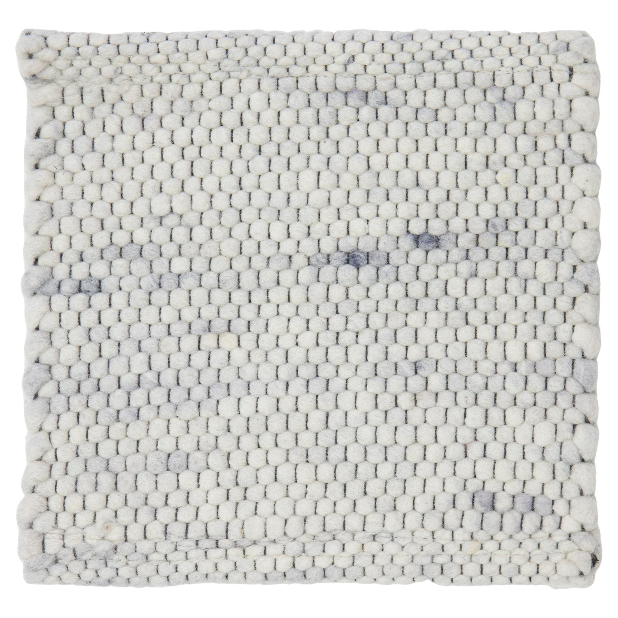 Tappeto in lana personalizzato con texture avorio moderno di Apadana