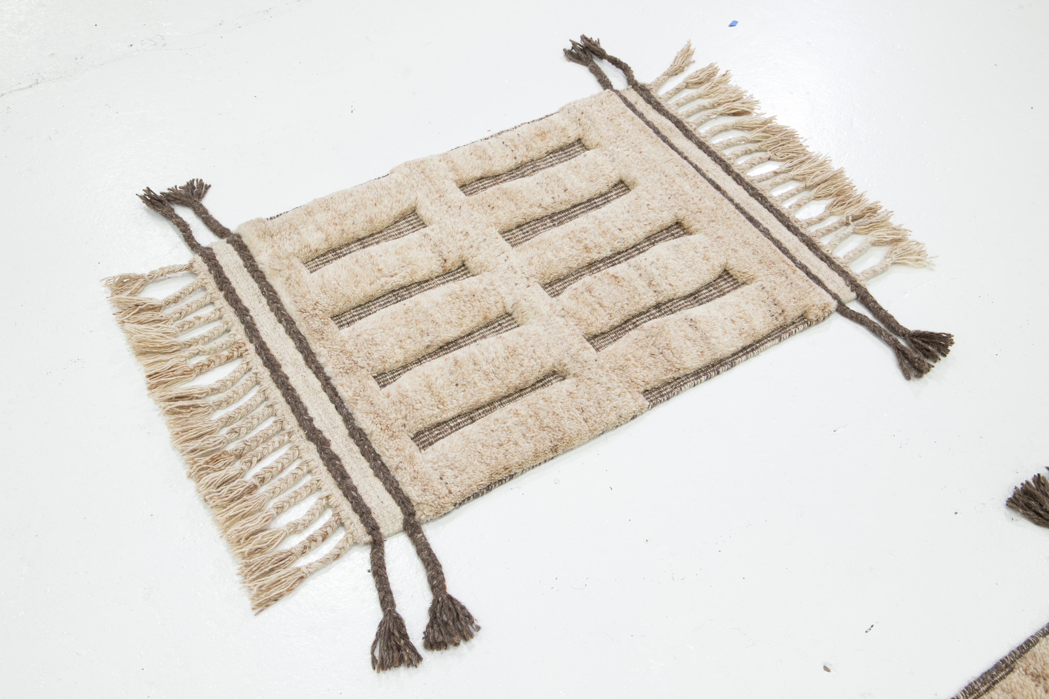 This handcrafted custom wool rug, available in multiple colors, is part of our Safi Collection. We use hand-knotted techniques for superior quality and longevity. 
The estimated lead time for customs is 15-20 weeks.
Material: Wool
Techniques: