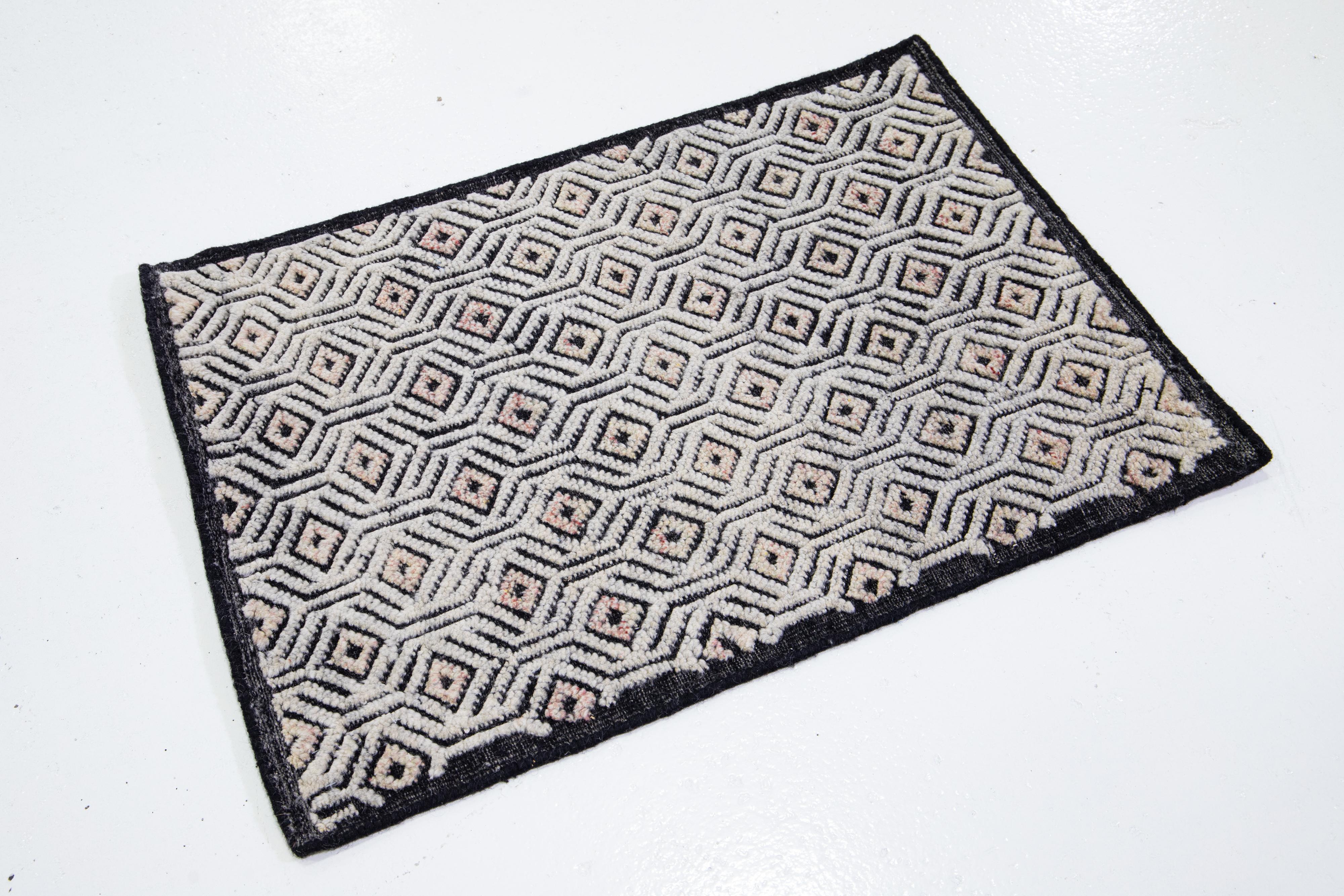 This handcrafted custom wool rug, available in multiple colors, is part of our Safi Collection. We use hand-knotted techniques for superior quality and longevity. 
The estimated lead time for customs is 15-20 weeks.
Material: Wool
Techniques: