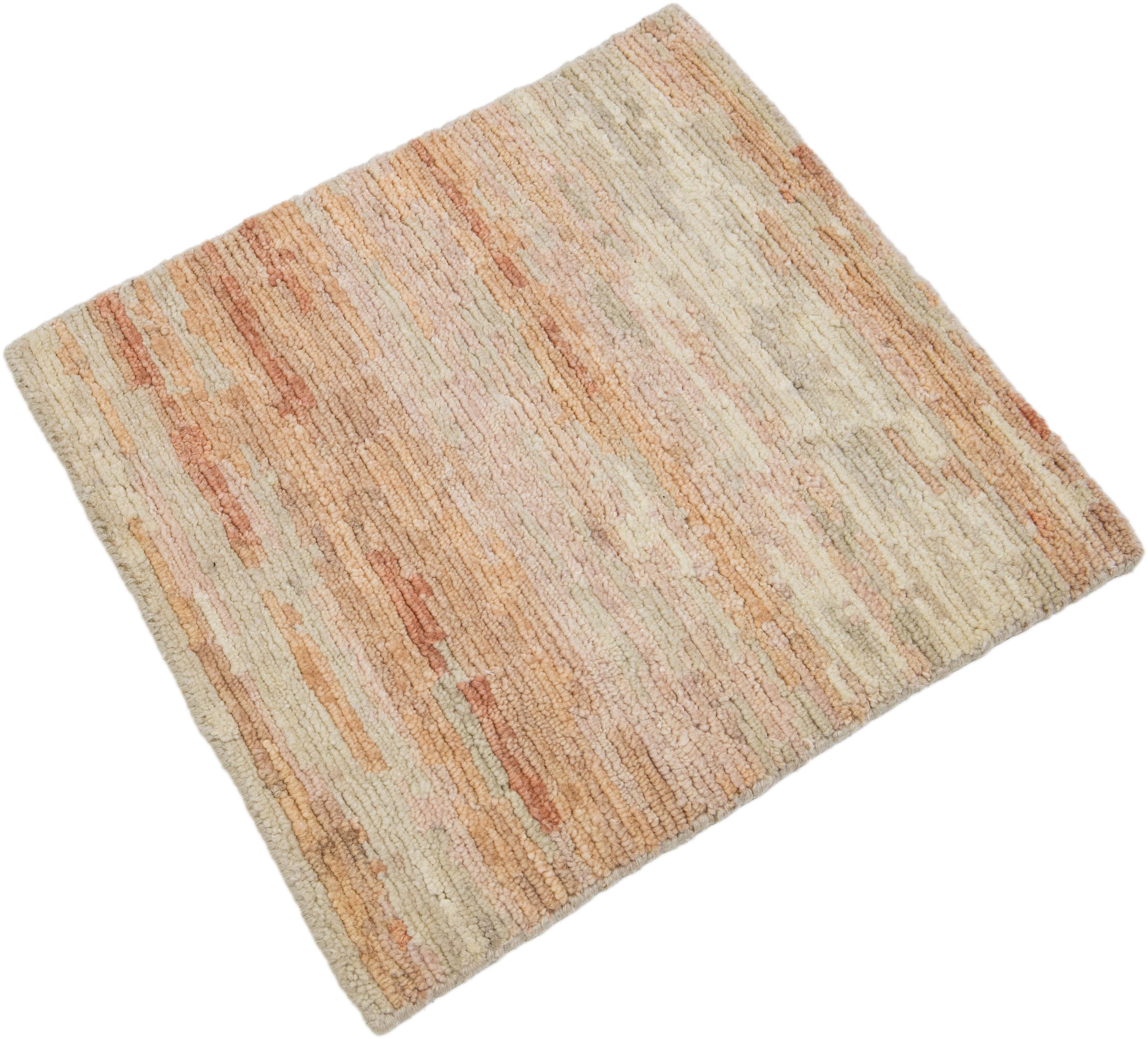 This handcrafted custom wool rug, available in multiple colors, is part of our Safi Collection. We use hand-knotted techniques for superior quality and longevity. 
The estimated lead time for customs is 15-20 weeks.
Material: Wool
Techniques: