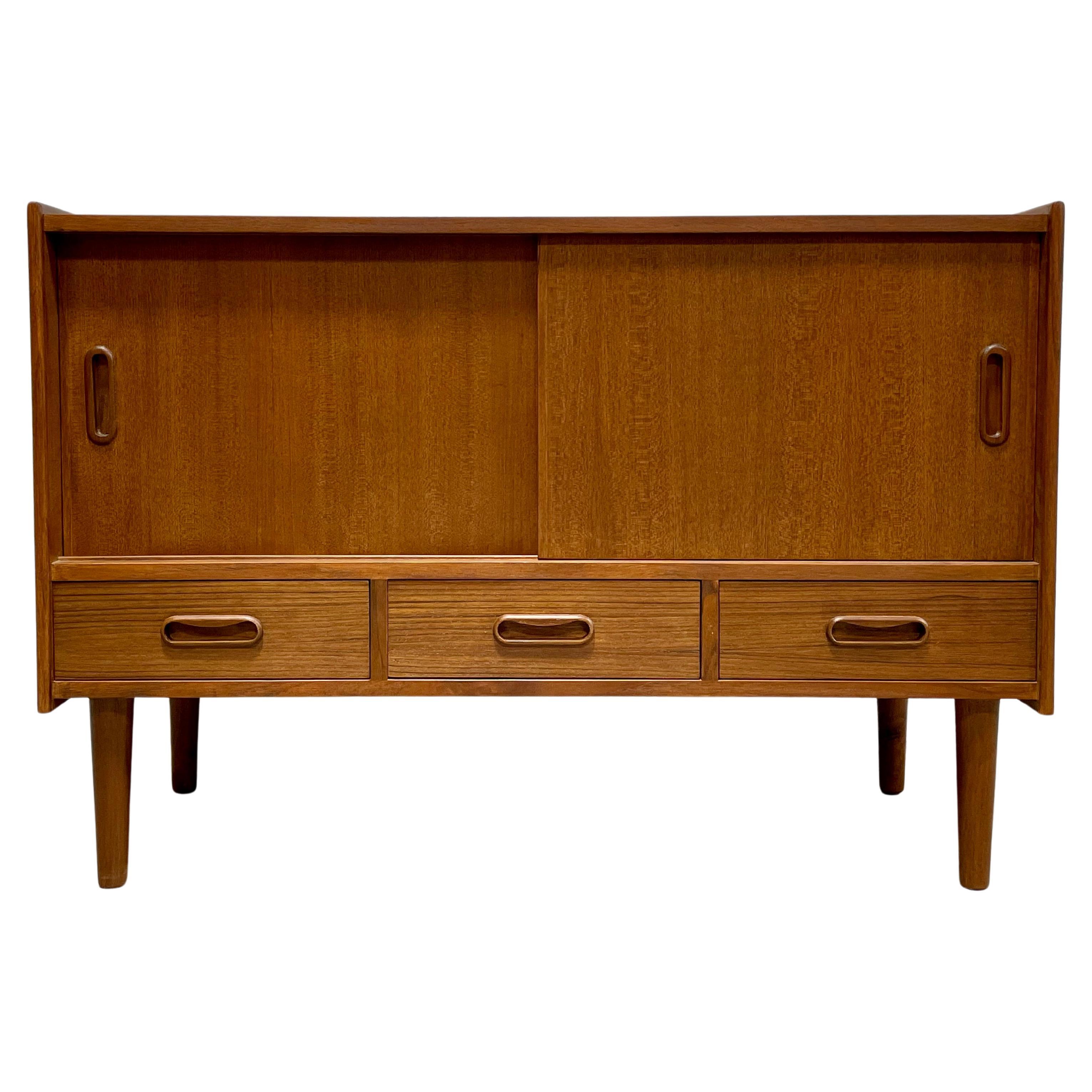 Mid Century Modern styled Handmade Credenza / Media Stand in a perfectly tailored apartment size. This is the smallest credenza in our handmade lineup but boy does it pack a punch, providing you with the essential storage you need without taking up