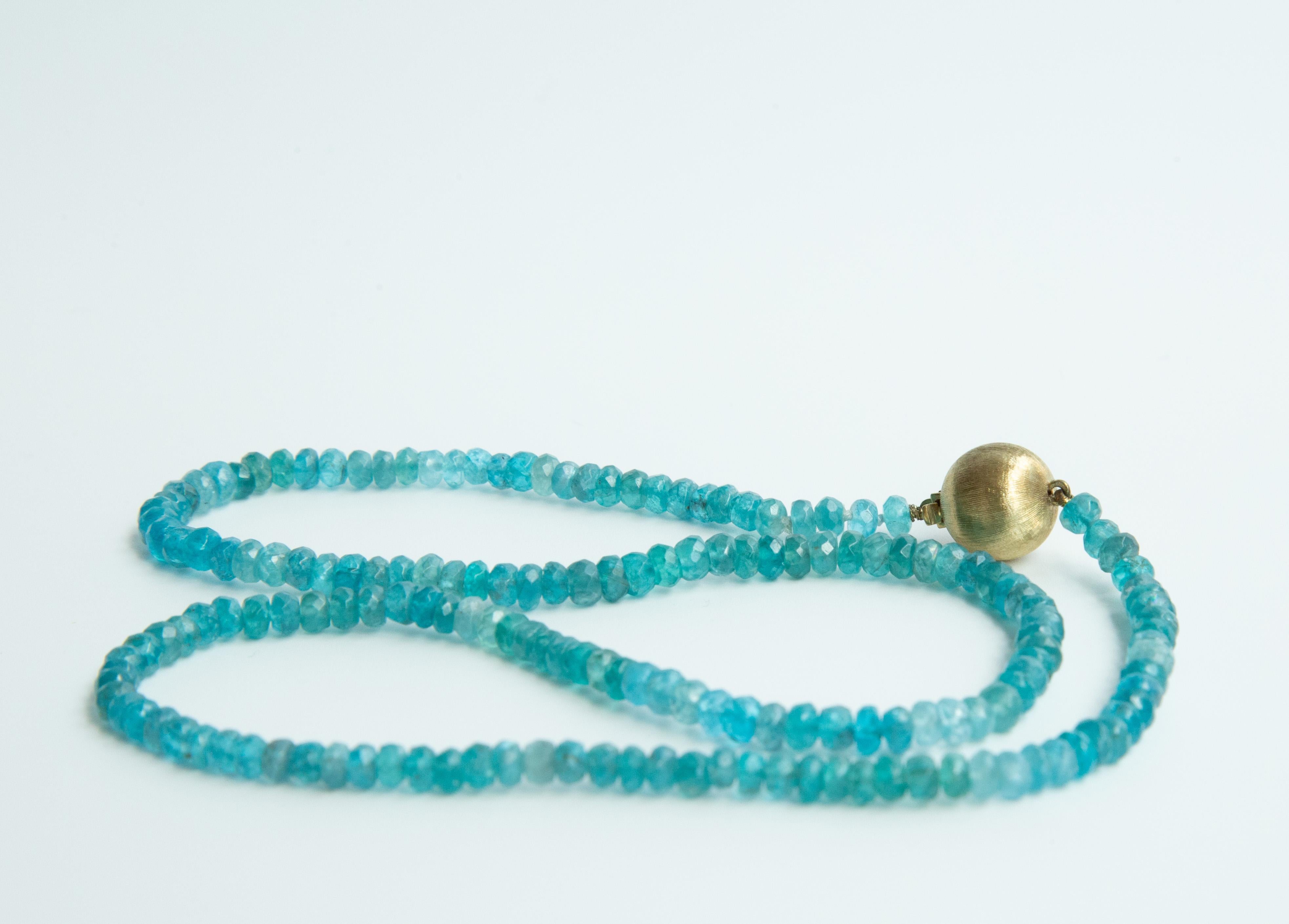 Modern Apatite Beaded Necklace with a 14 Karat Yellow Gold Ball Clasp For Sale