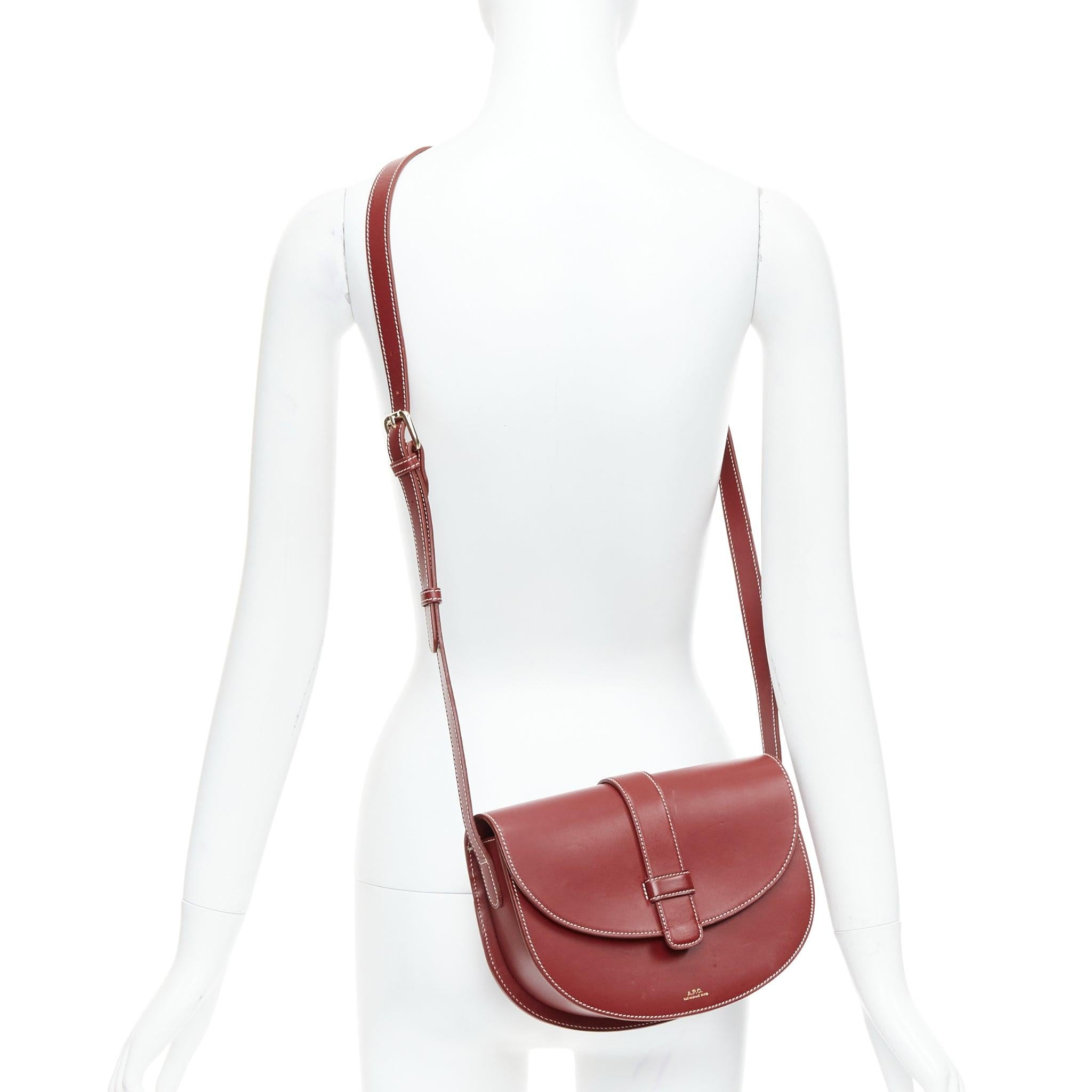 A.P.C. Eloise burgundy smooth leather saddle crossbody shoulder bag
Reference: ECLO/A00060
Brand: A.P.C.
Model: Eloise
Material: Leather
Color: Burgundy
Pattern: Solid
Closure: Snap Buttons
Lining: Red Fabric
Extra Details: Buffed smooth leather