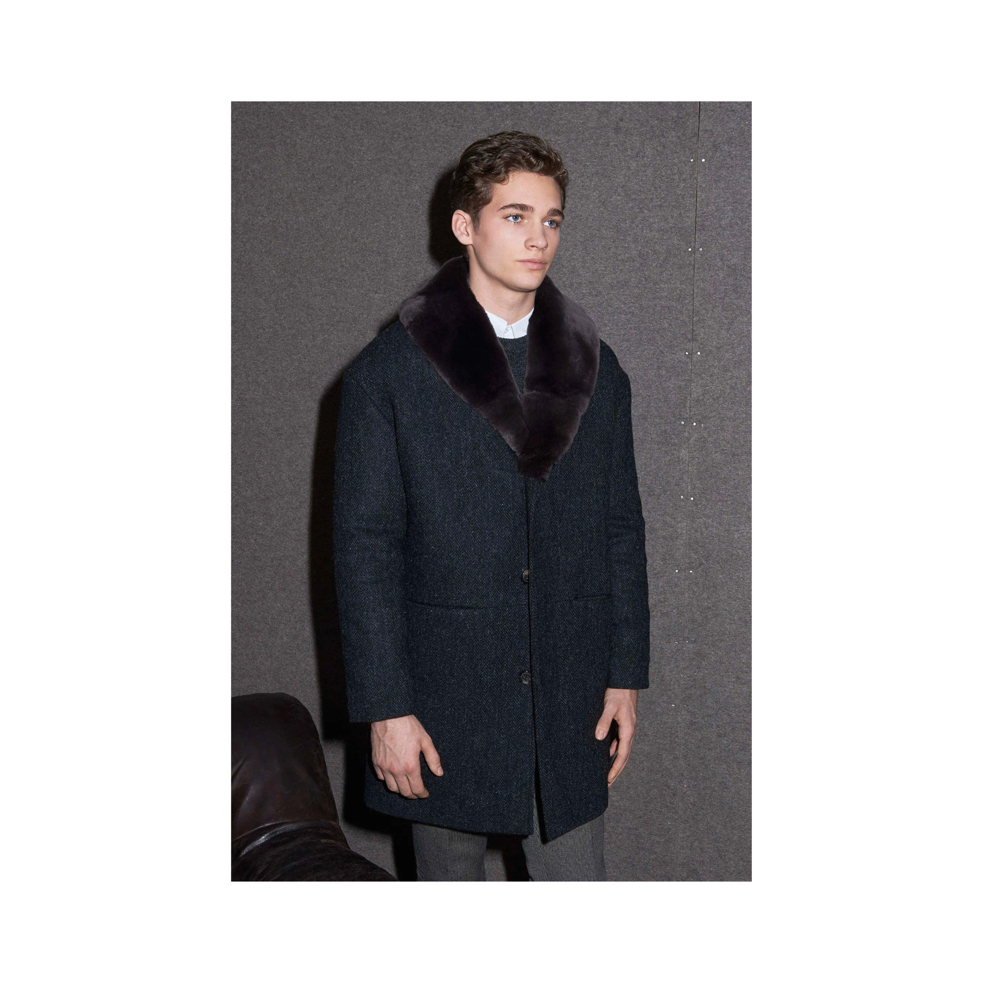 Experience luxury and warmth with the A.P.C. Faux Fur Coat from their Fall 2024 collection. Made of a wool blend, this long overcoat features a thick faux fur lining that extends to the collar and a 3 button closure. 
 Remarks: There is no