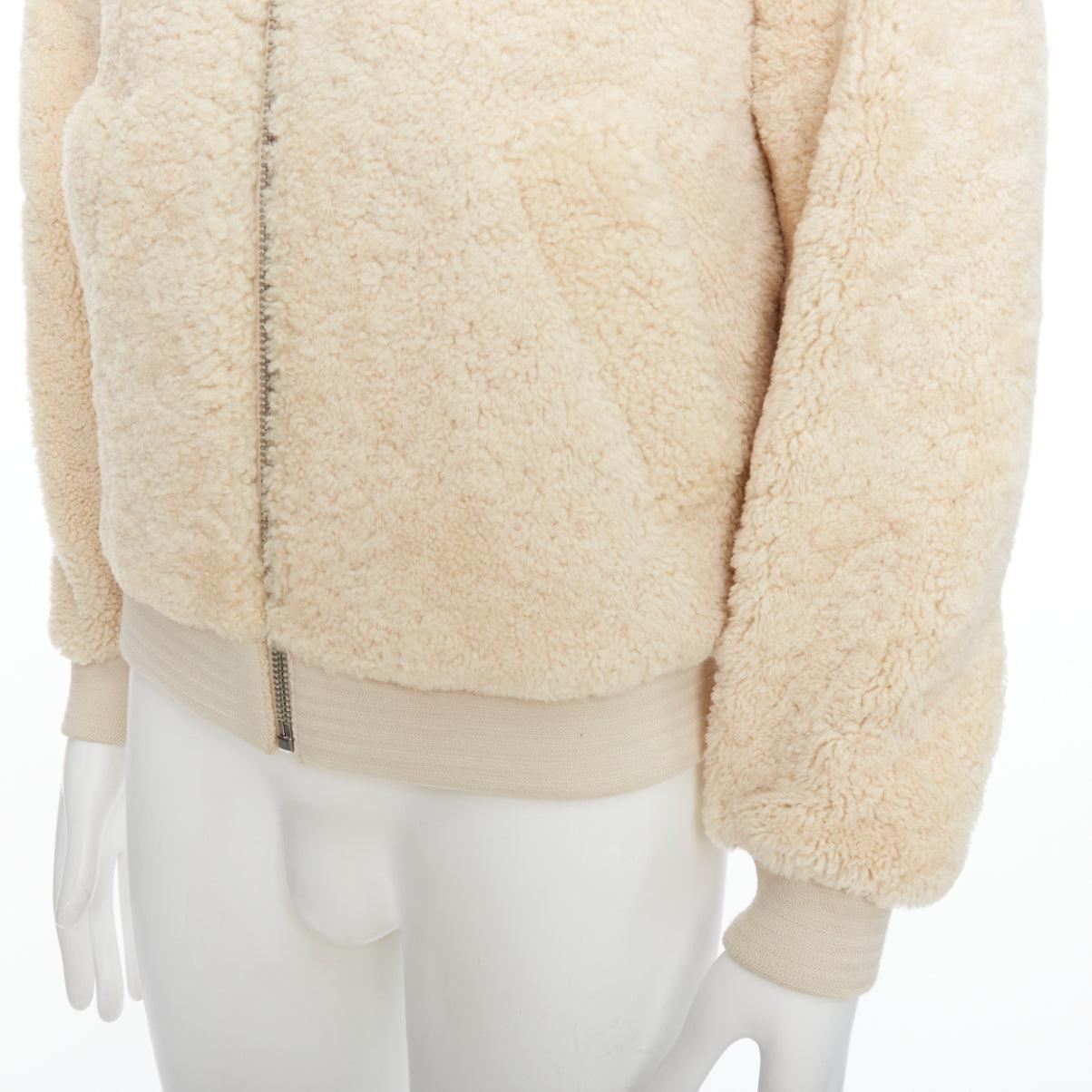A.P.C. LOUIS W cream lambskin shearling zip front bomber jacket S
Reference: CNLE/A00309
Brand: A.P.C.
Collection: Louis W Collection
Material: Shearling
Color: Cream, Silver
Pattern: Solid
Closure: Zip
Lining: Cream Fabric
Made in: