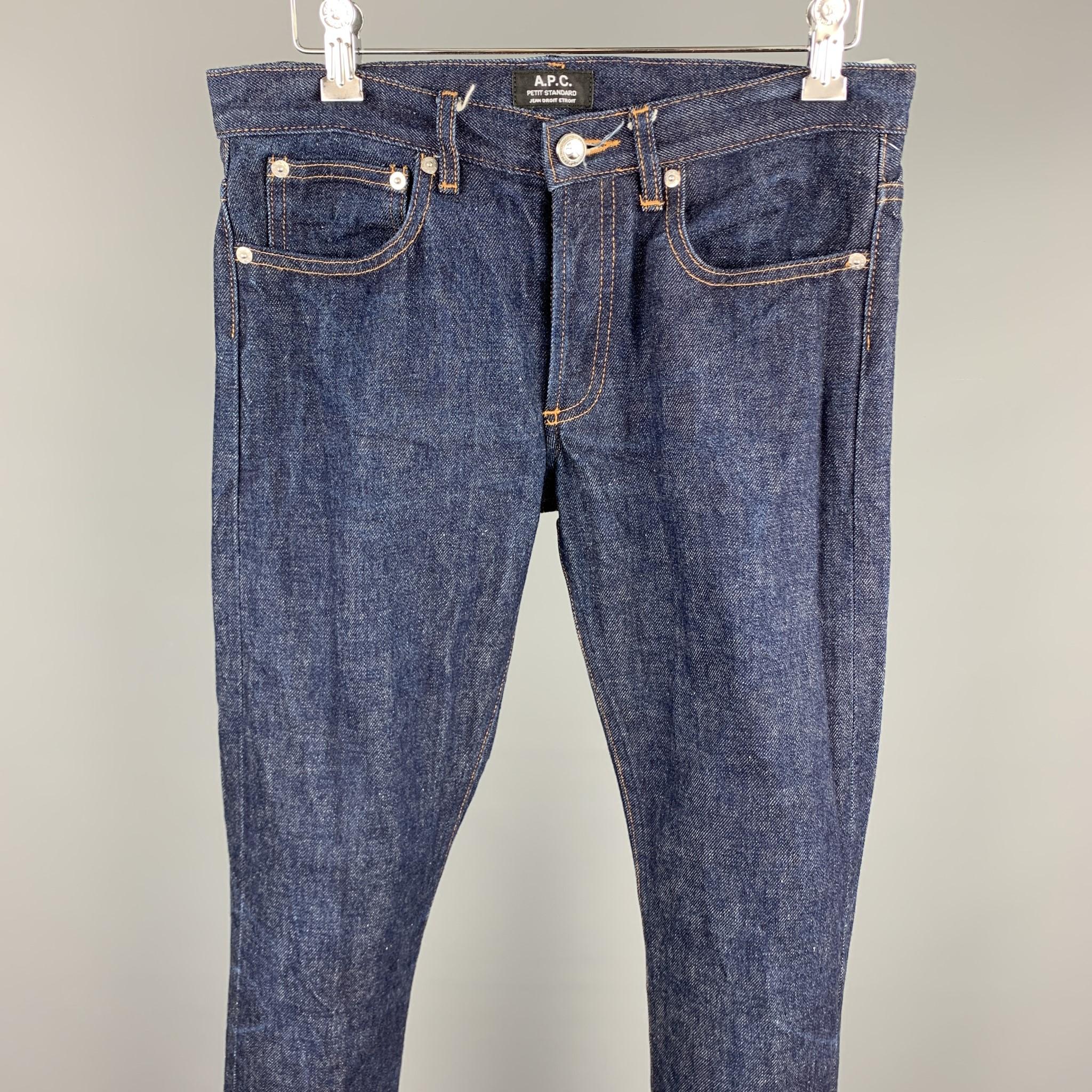 A.P.C jeans comes in a indigo denim featuring a slim fit, contrast stitching, and a button fly closure. 

Very Good Pre-Owned Condition.
Marked: 28

Measurements:

Waist: 30 in. 
Rise: 8 in. 
Inseam: 30 in. 