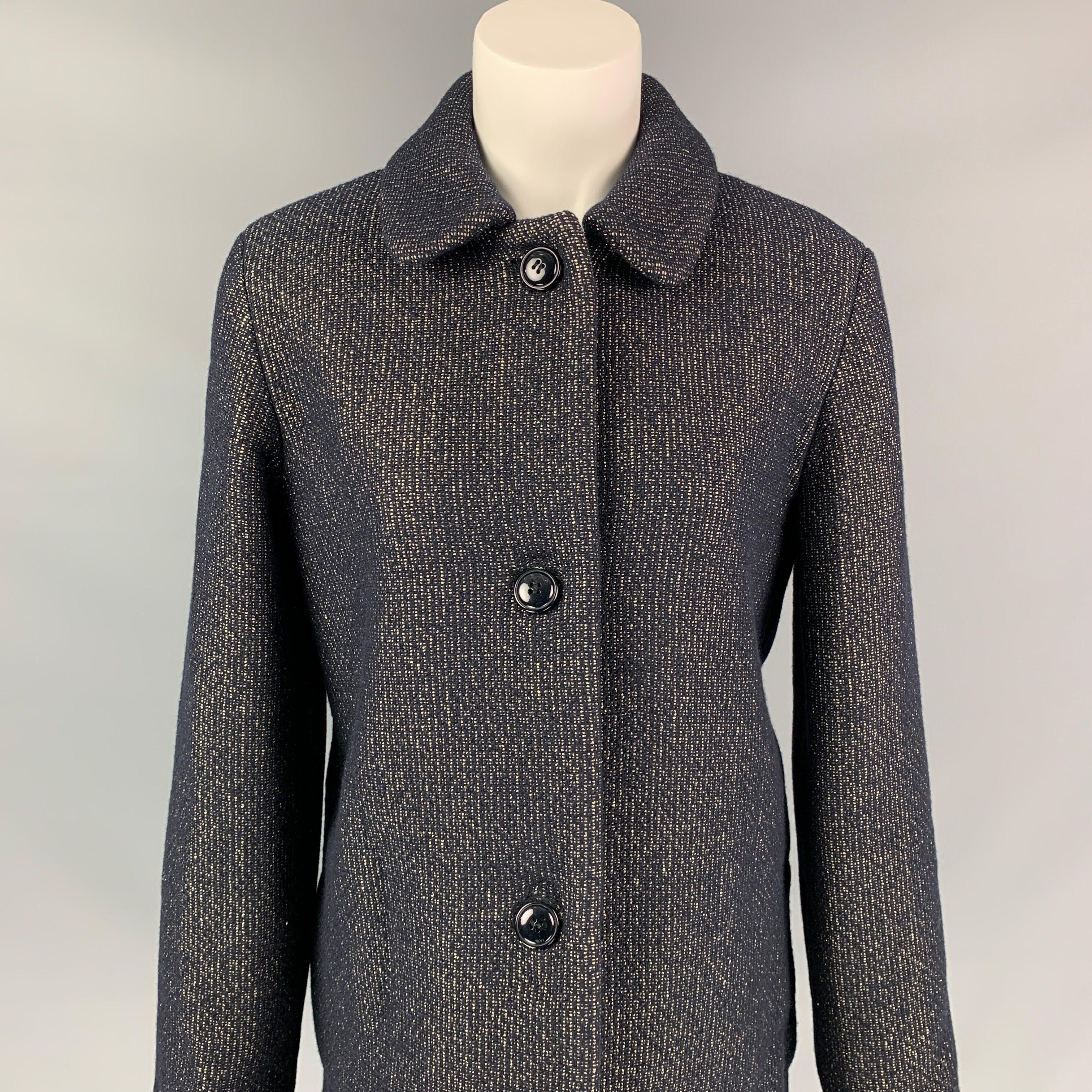 A.P.C coat comes in a black & gold metallic heather wool blend with a full liner featuring a spread collar, slit pockets, single back vent, and a buttoned closure.
Very Good
Pre-Owned Condition. 

Marked:  38 

Measurements: 
 
Shoulder:
 16.5