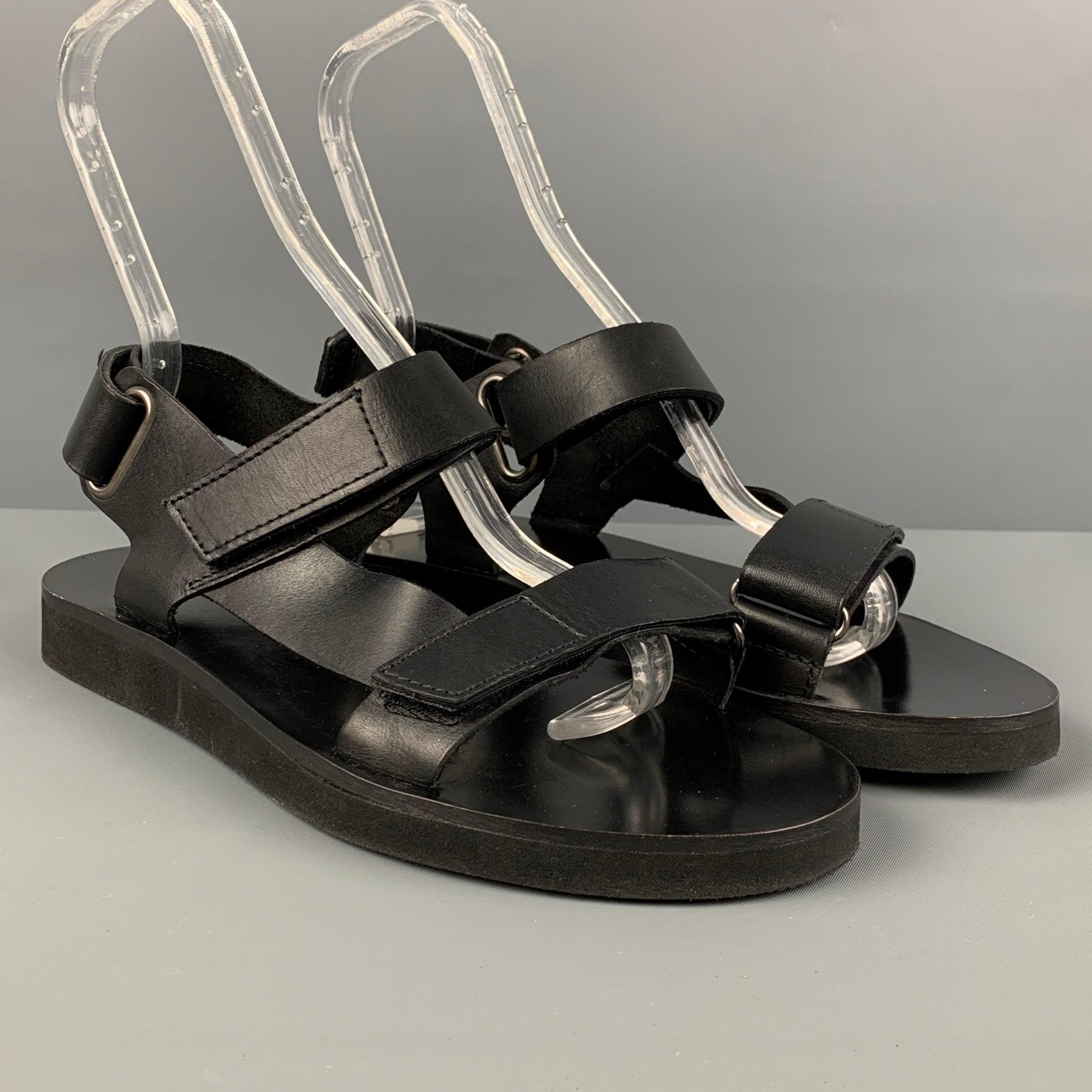 A.P.C 'VLAD' sandals comes in a black leather featuring a round toe and wide hoop & loop straps.
 Very Good
 Pre-Owned Condition. 
 

 Marked:  41Outsole: 10.75 inches x 4.25 inches 
  
  
  
 Sui Generis Reference: 121855
 Category: Sandals
 More