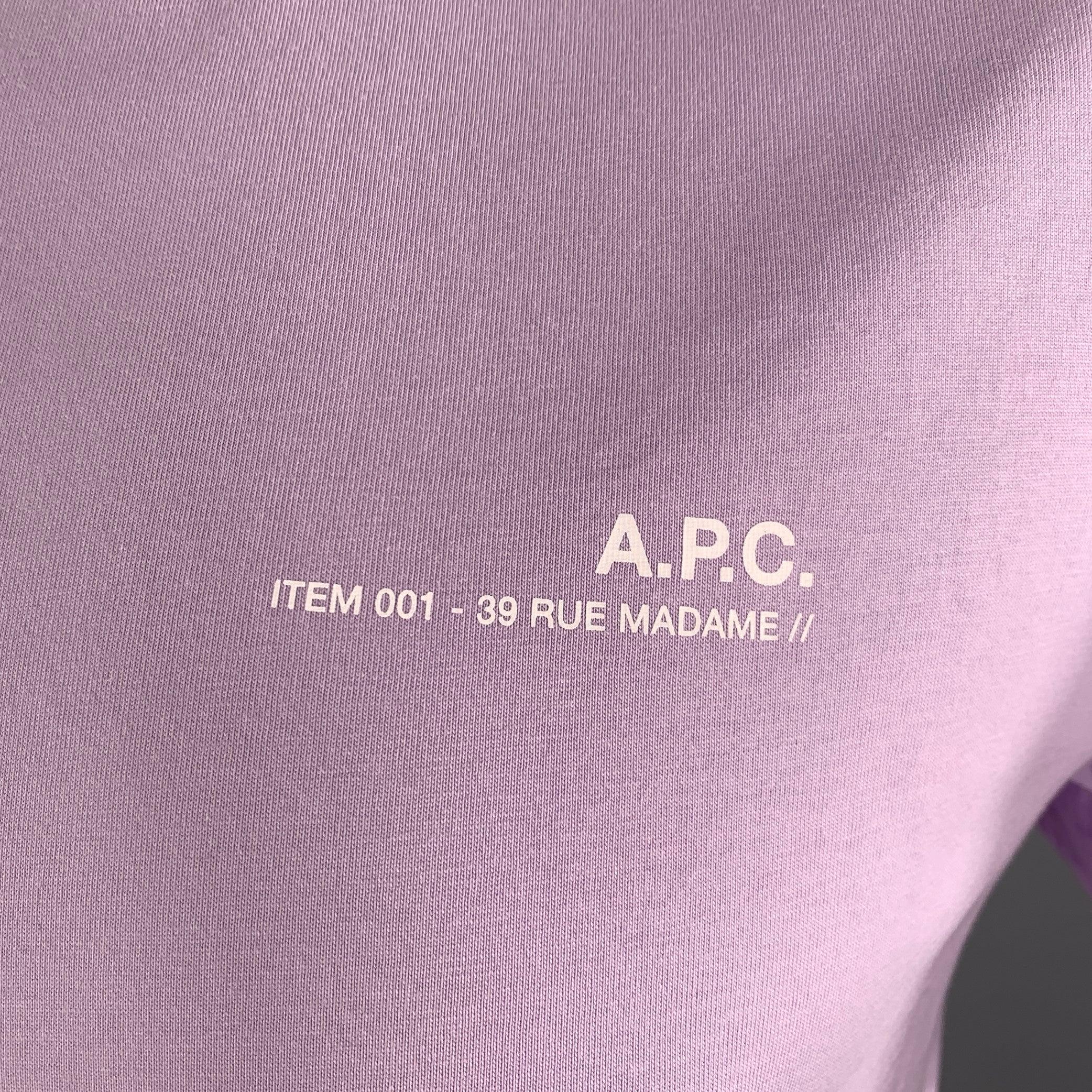 A.P.C. t-shirt
in a
lavender purple cotton jersey featuring white logo, and crew neck.Excellent Pre-Owned Condition. 

Marked:   L 

Measurements: 
 
Shoulder: 17.5 inches Chest: 42 inches Sleeve: 9 inches Length: 26 inches 
  
  
 
Sui Generis