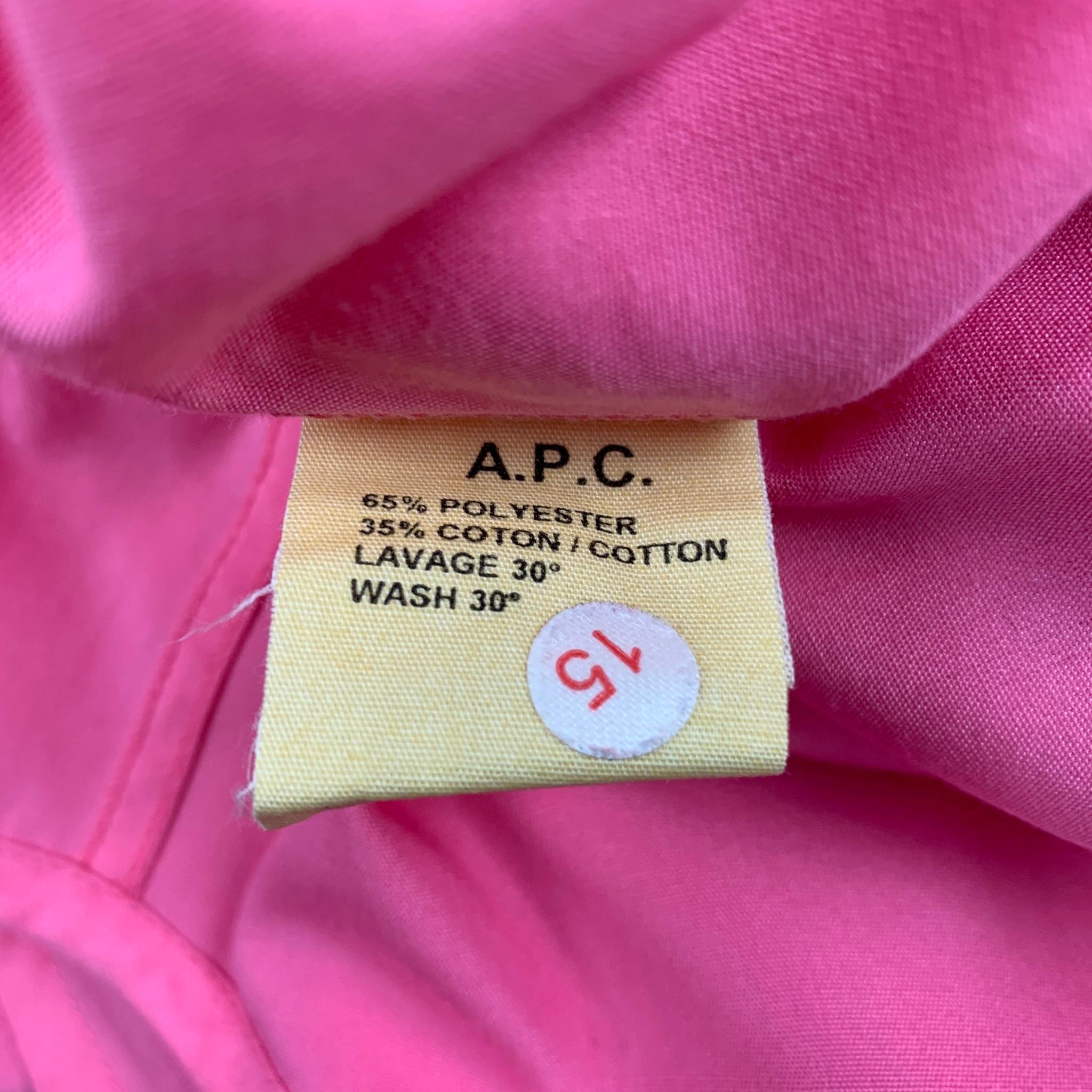 A.P.C long sleeve shirt comes in a pink polyester / cotton featuring a button up style and a spread collar. 

Very Good Pre-Owned Condition.
Marked: S

Measurements:

Shoulder: 17 in.
Chest: 38 in.
Sleeve: 25.5 in.
Length: 30.5 in. 

SKU: