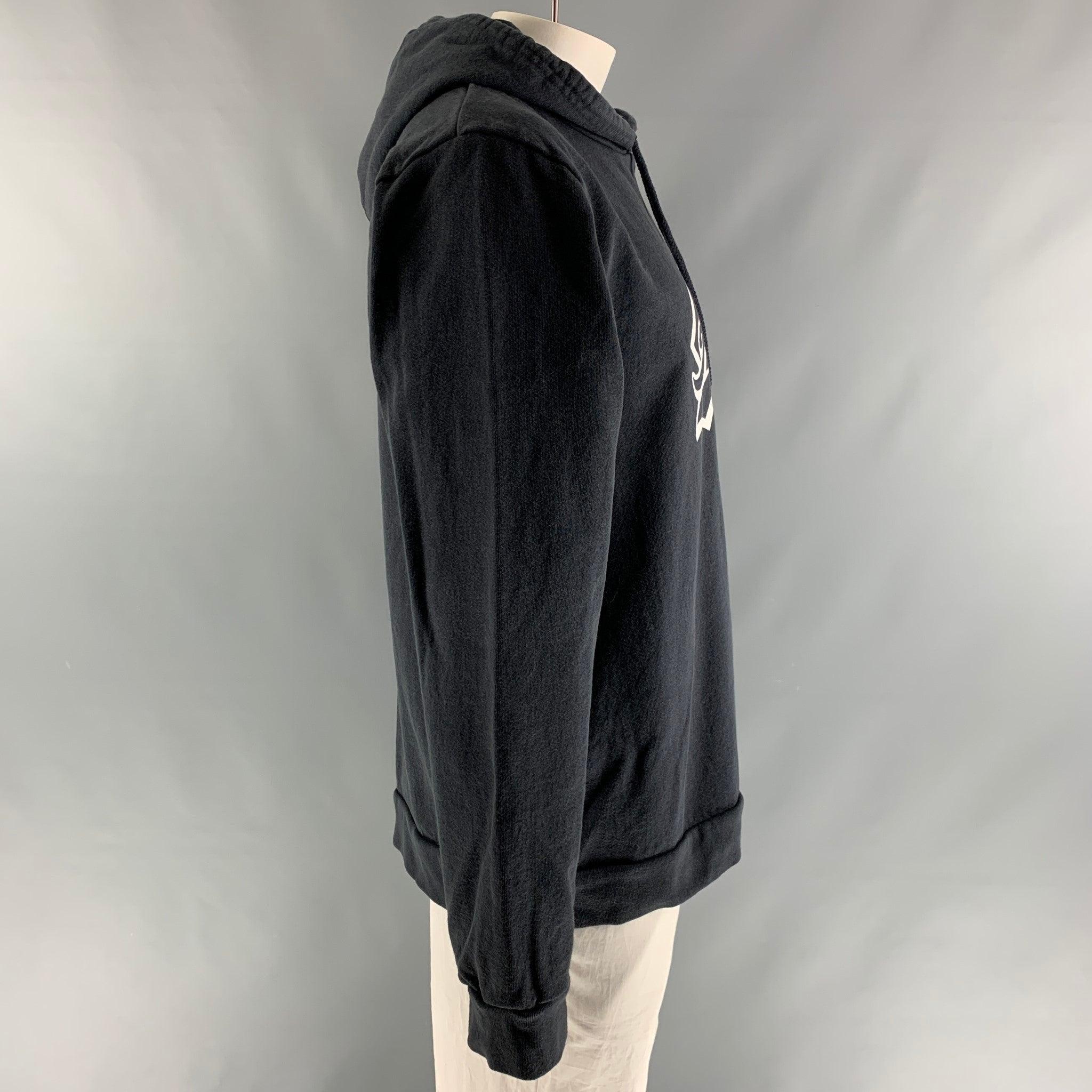APC long sleeve hoodie sweatshirt comes in charcoal cotton/polyester french terry with a white graphic print logo at center front. Made in
USA.Good Pre-Owned Condition. Moderate signs of being worn. 

Marked:   XXL 

Measurements: 
 
Shoulder: 21
