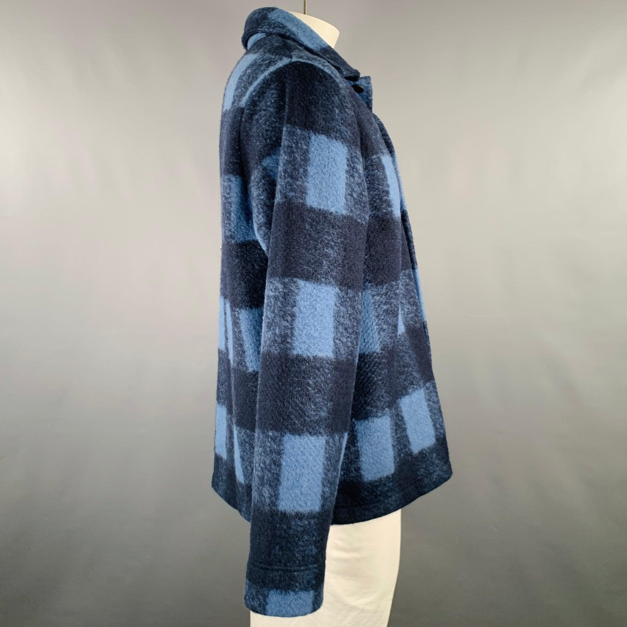 A.P.C. jacket in a
polyester wool blend featuring a plaid pattern, shirt jacket style, and button closure. Made in Portugal.Excellent Pre-Owned Condition. 

Marked:   XXL 

Measurements: 
 
Shoulder: 20 inches Chest: 52 inches Sleeve: 27 inches