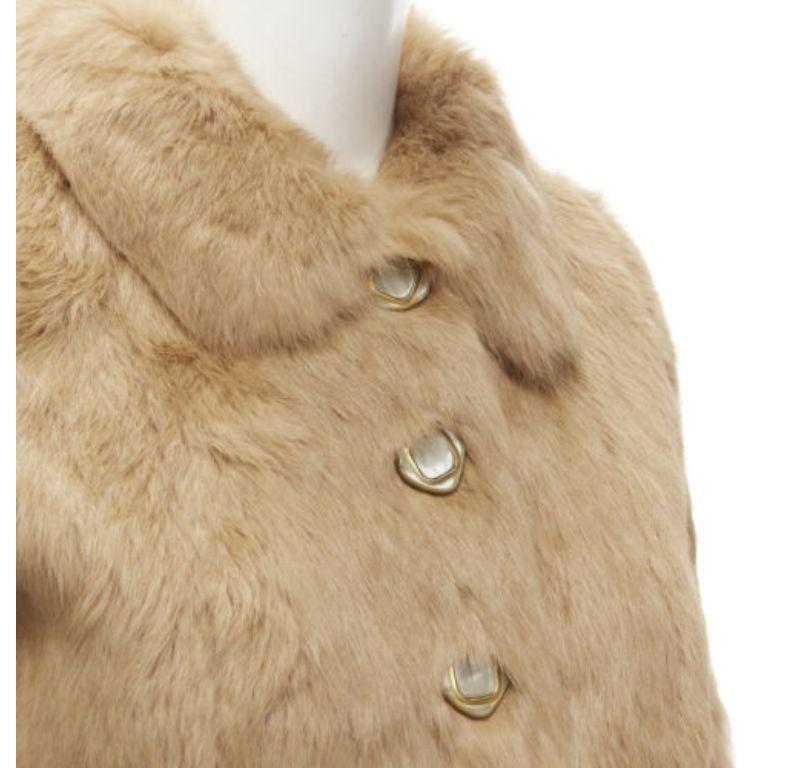APC tan brown genuine fur gold-tone buttons winter coat jacket XS
Reference: YNWG/A00165
Brand: APC
Material: Fur
Color: Brown
Pattern: Solid
Closure: Button
Lining: Fabric
Made in: China

CONDITION:
Condition: Excellent, this item was pre-owned and