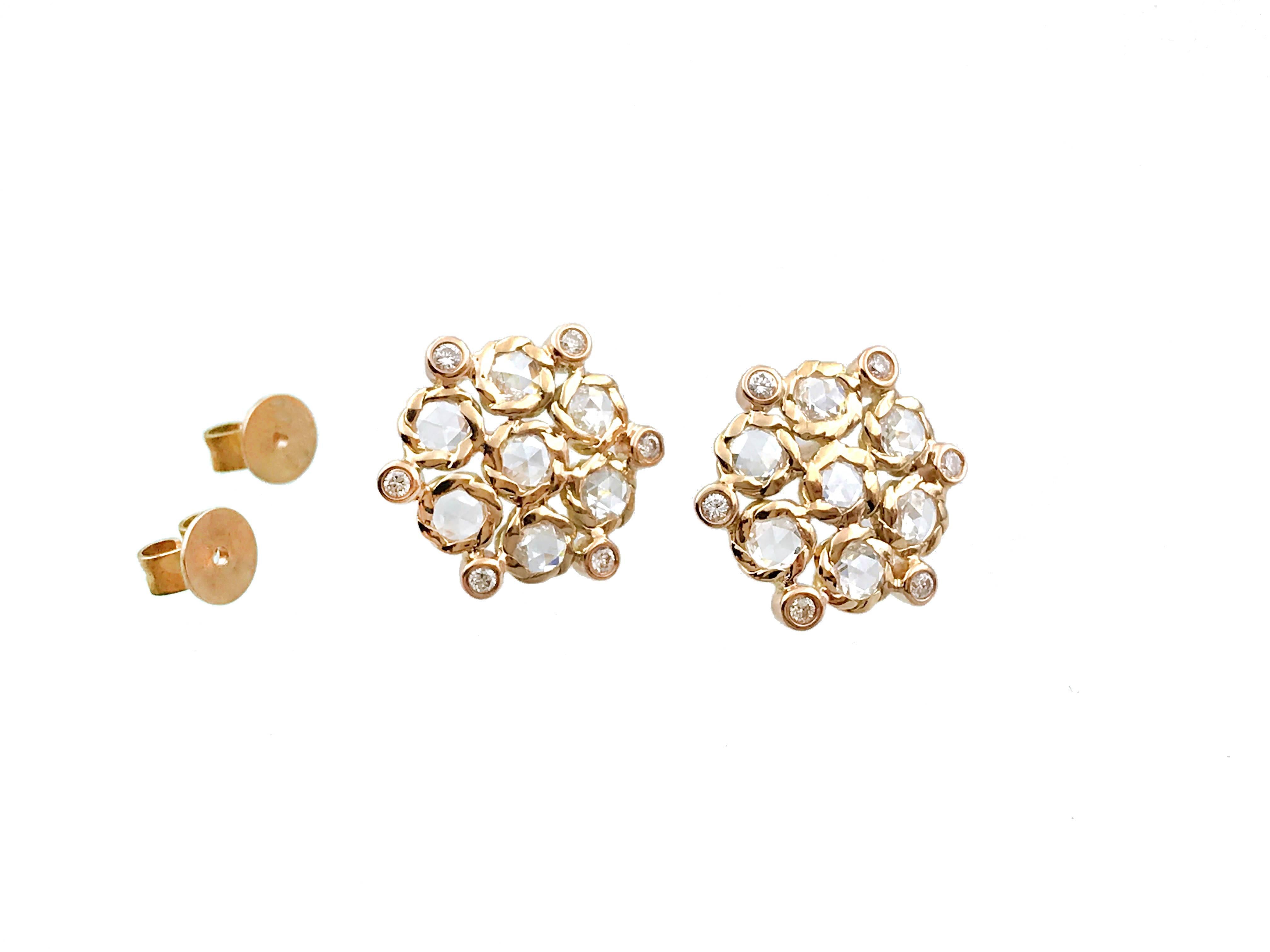 APHRODITE rose-cut diamond cluster floral studs, each featuring 7 rose-cut white diamonds,  hand set in JeweLyrie signature twist bezels, punctuated with small brilliant cut bezel set diamonds, arranged in floral pattern, 12mm in diameter. Total