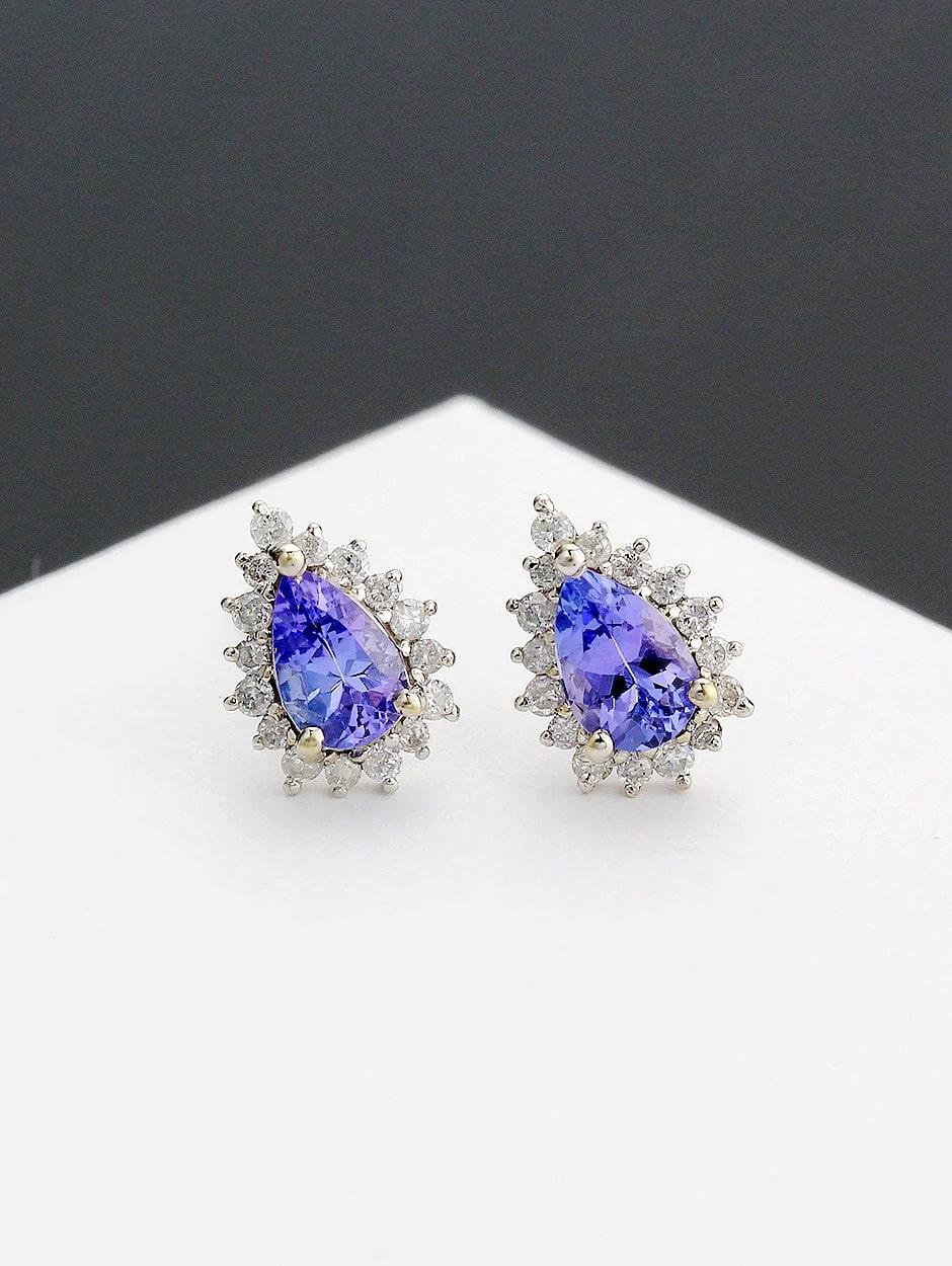 Stud tear drop design tanzanite earring, all with a high polish finish. Available in 18K White Gold.

Necklace Information
Diamond Type : Natural Diamond
Metal : 18K
Metal Color : White Gold
Diamond Carat Weight : 0.24ttcw
Tanzanite Carat Weight :