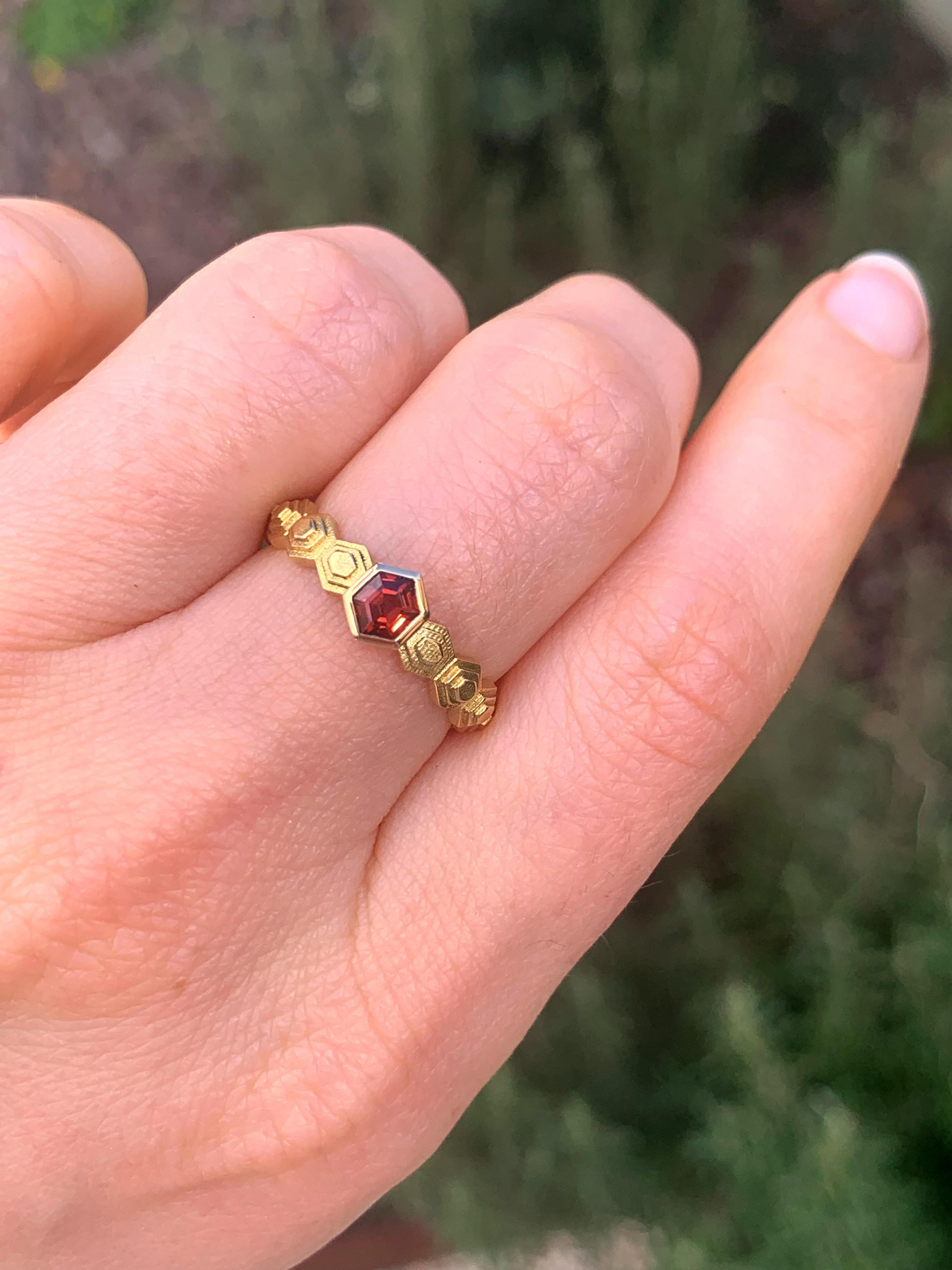 This ring is inspired by the hives made by bees. Indeed, bees are the main type of pollinator in many ecosystems containing flowering plants.

Unfortunately, bees, and other pollinator species, are currently critically endangered, with an extinction