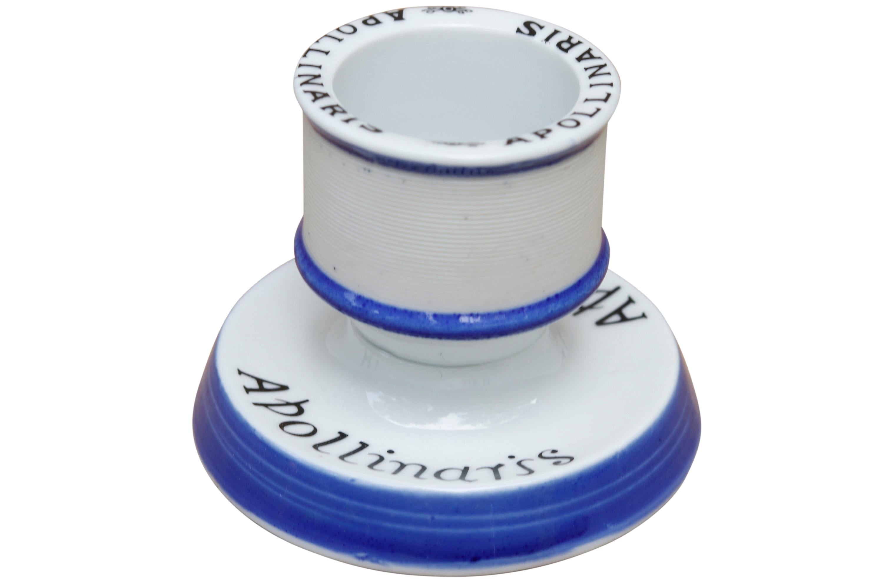 A vintage Apollinaris ceramic match striker and holder. Traditionally used in cafes, bars etc. In excellent condition.
 