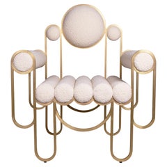 Apollo-Sessel, Clubsessel, modern, skulptural, Messinggestell und cremefarbener Bouclé