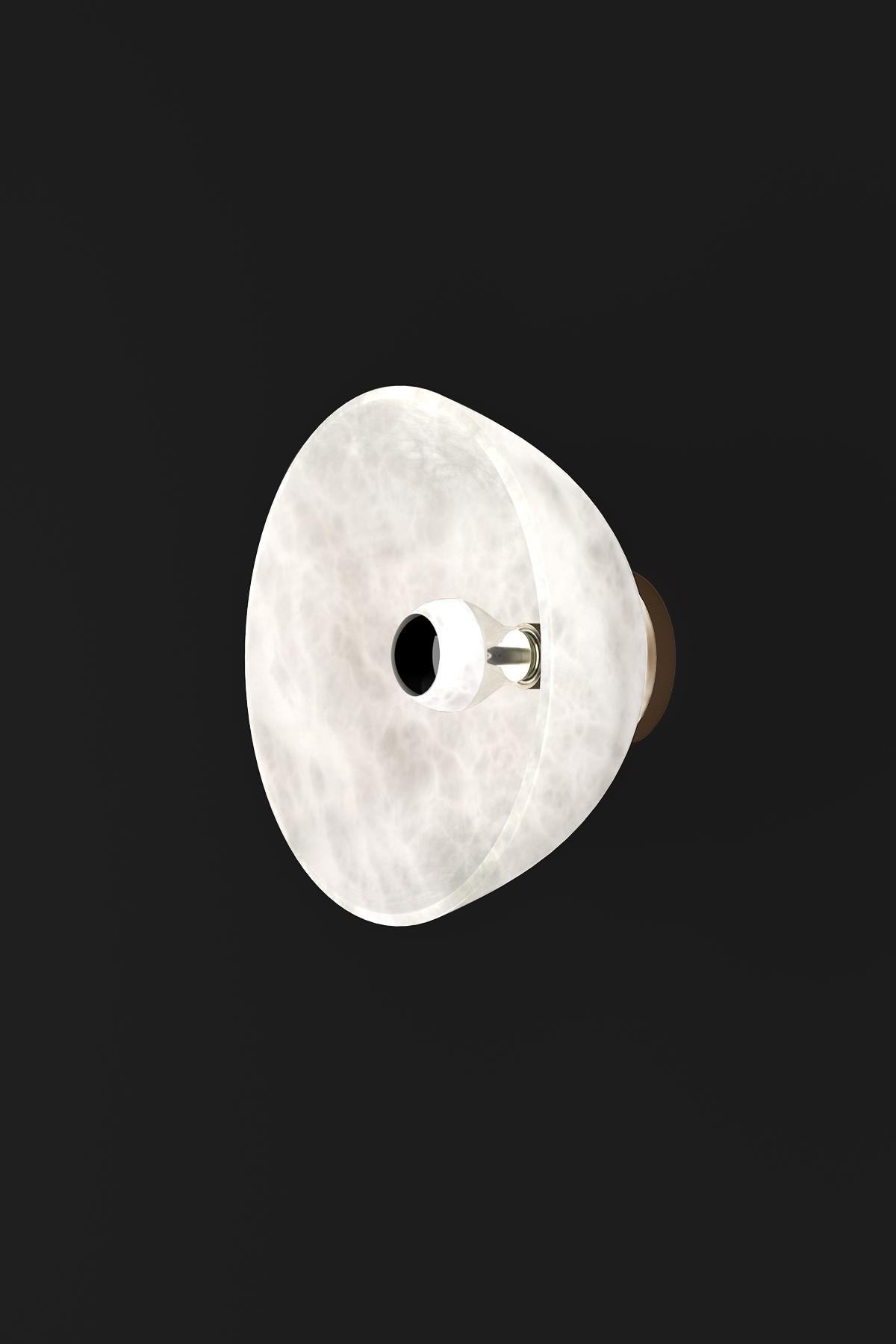 Apollo Bronze Wall Lamp by Alabastro Italiano
Dimensions: Ø 30 x W 17,5 cm.
Materials: White alabaster and bronze.

Available in different finishes: Shiny Silver, Bronze, Brushed Brass, Ruggine of Florence, Brushed Burnished, Shiny Gold, Brushed