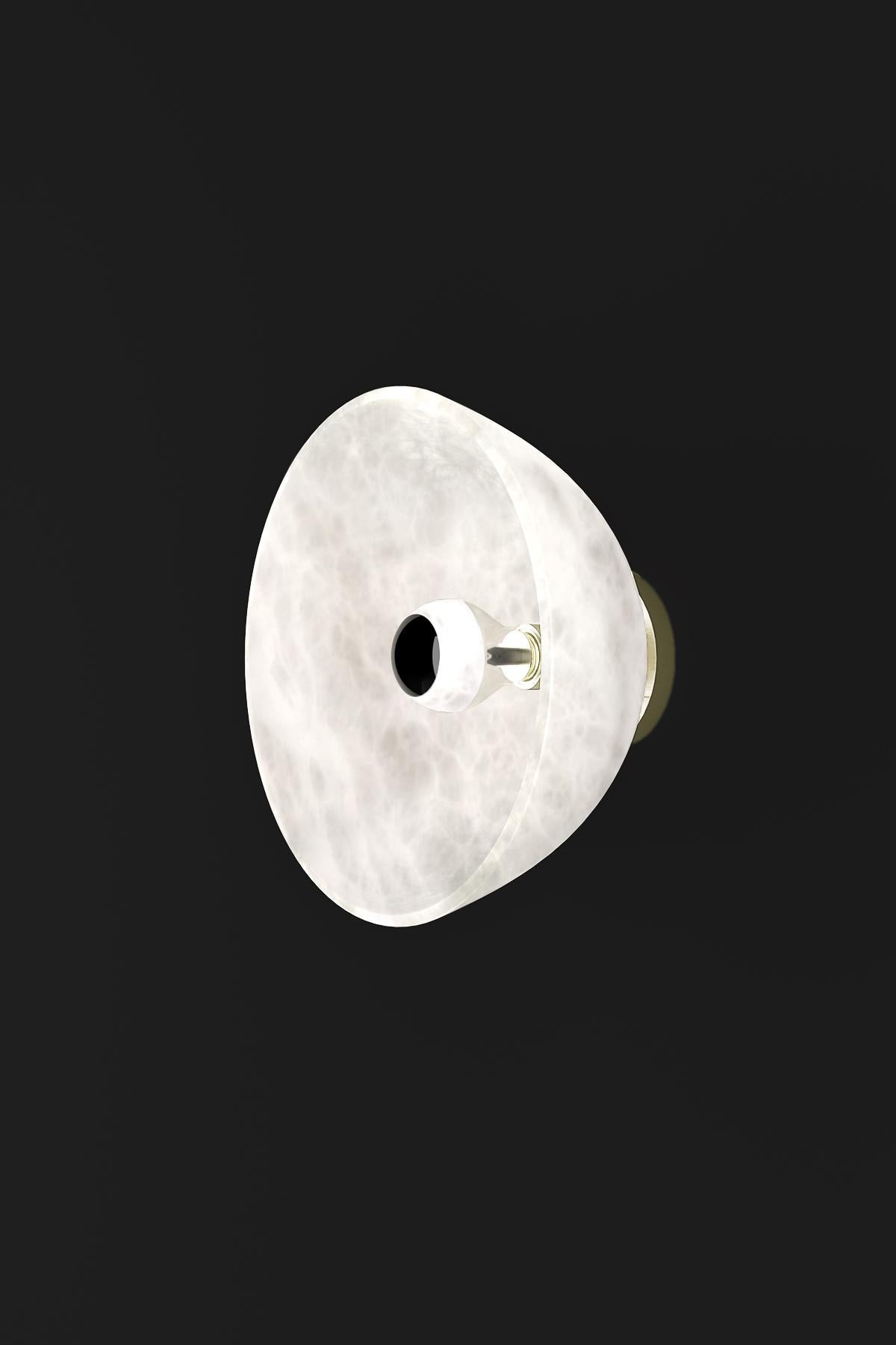 Apollo Brushed Brass Wall Lamp by Alabastro Italiano
Dimensions: Ø 30 x W 17,5 cm.
Materials: White alabaster and brass.

Available in different finishes: Shiny Silver, Bronze, Brushed Brass, Ruggine of Florence, Brushed Burnished, Shiny Gold,
