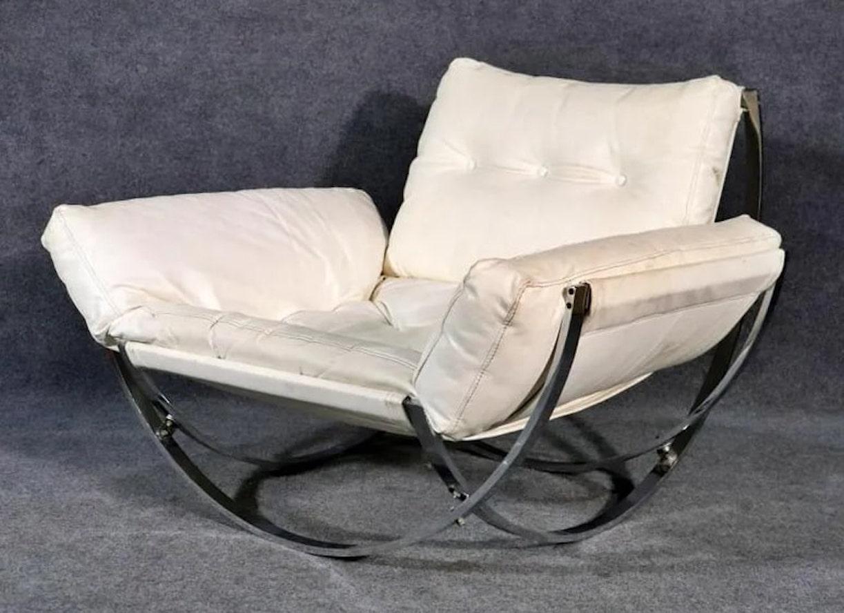 Designed by Lennart Bender for Charlton Company. Chrome frame. Naugahyde upholstery. 
Chair measures 29 1/2