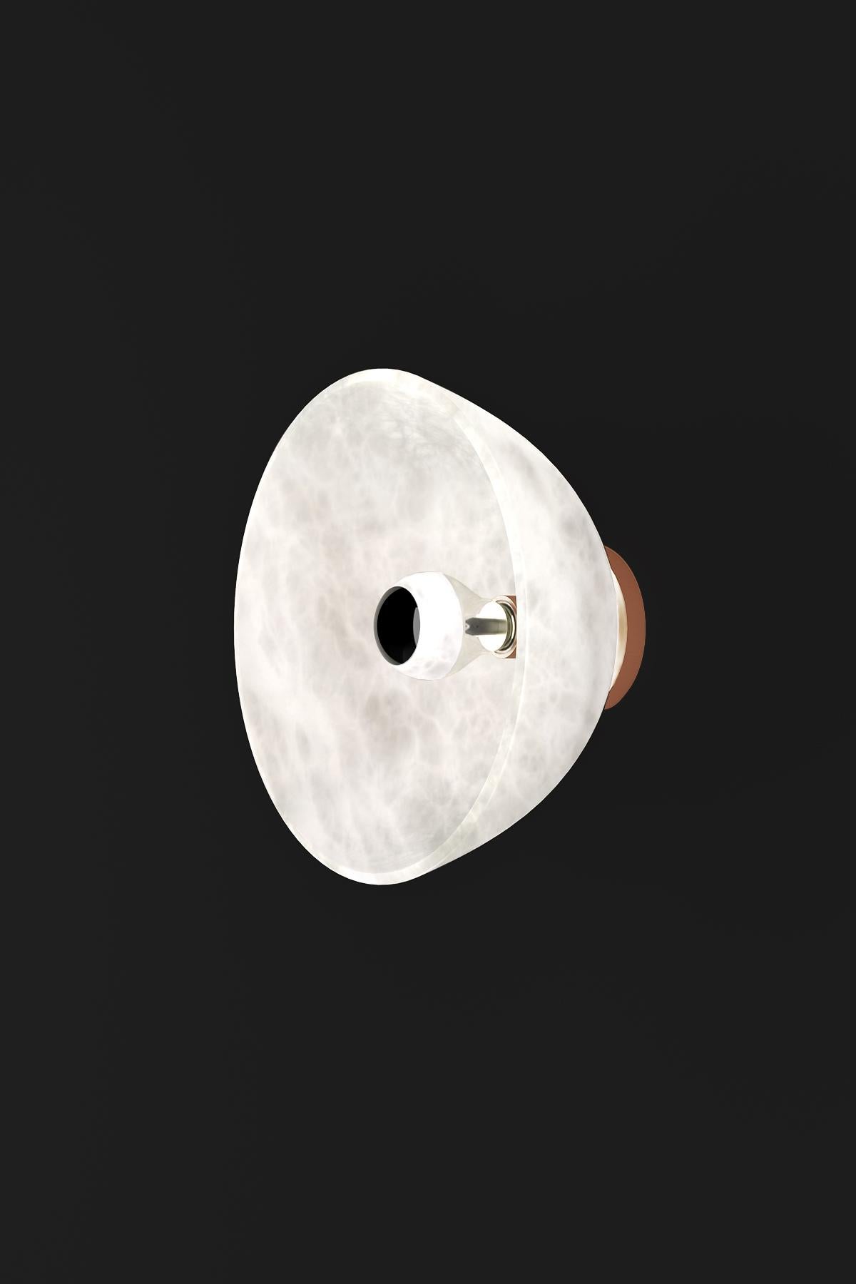 Apollo Copper Wall Lamp by Alabastro Italiano
Dimensions: Ø 30 x W 17,5 cm.
Materials: White alabaster and copper.

Available in different finishes: Shiny Silver, Bronze, Brushed Brass, Ruggine of Florence, Brushed Burnished, Shiny Gold, Brushed