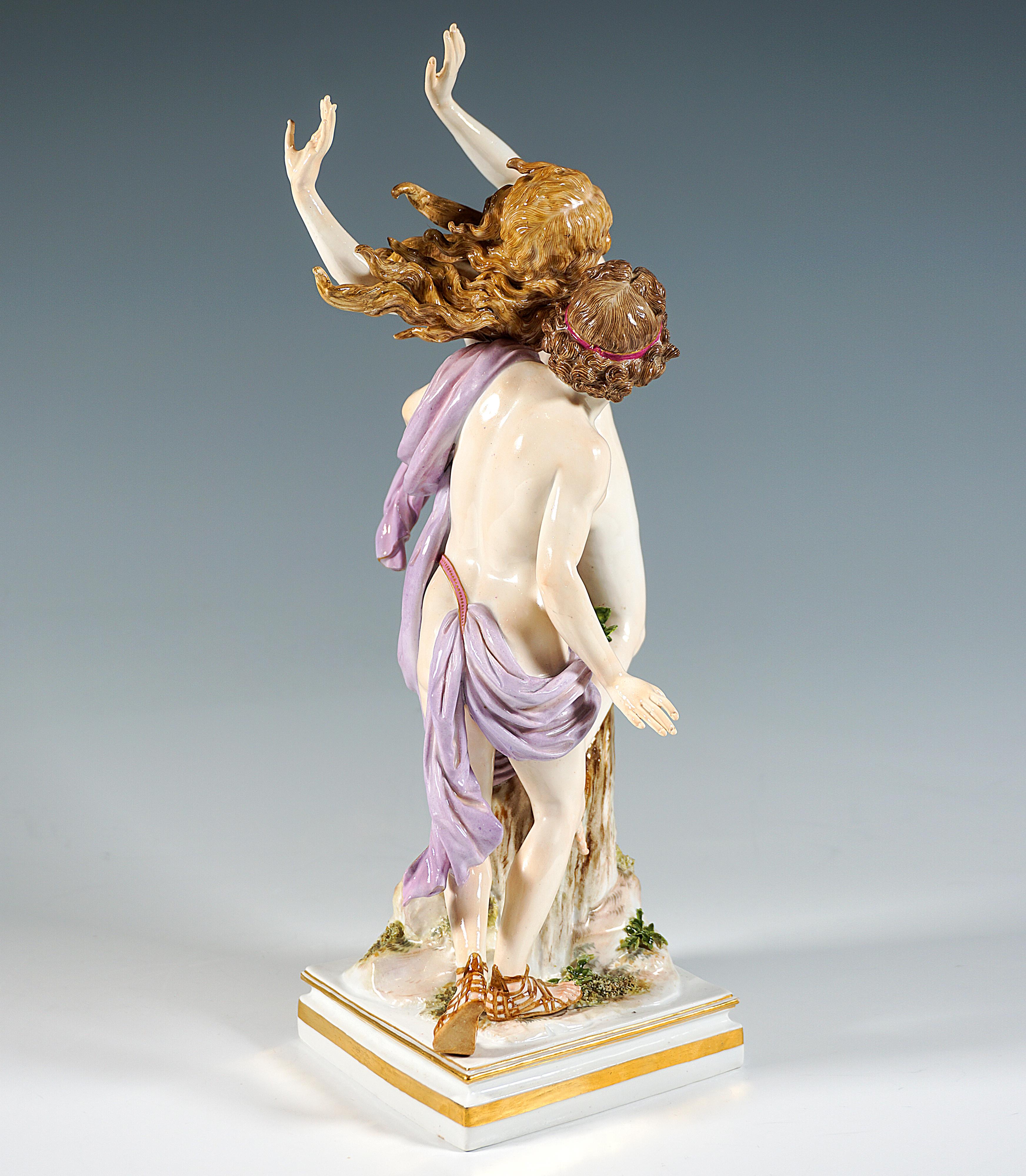 Excellent large and rare Meissen figurine group from the 19th century:
Apollo clothed with a cloak embraces Daphne from behind, who is fleeing from him and has already frozen into a laurel tree in a twisting movement.
Based on a stepped, fluted
