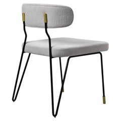 Apollo Dining Chair, fabric seat, Black lacquered iron frame, Brass details