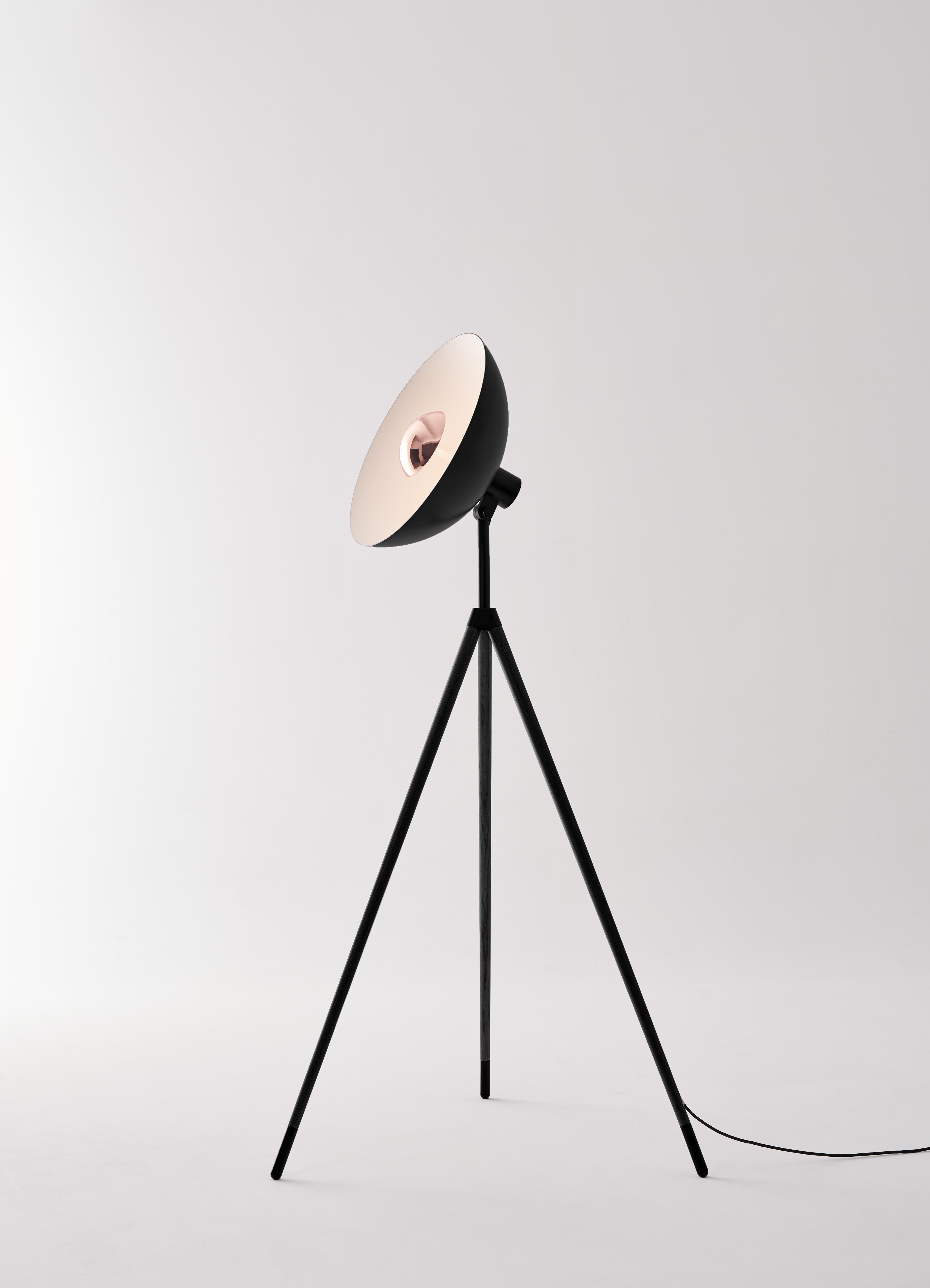 The huge shade embraces and sheds the light at the same time, while the LED module is integrated behind the metal cap, preventing the light from being visible and causing glare. APOLLO Mega Floor Lamp is married with wooden tripods along with a