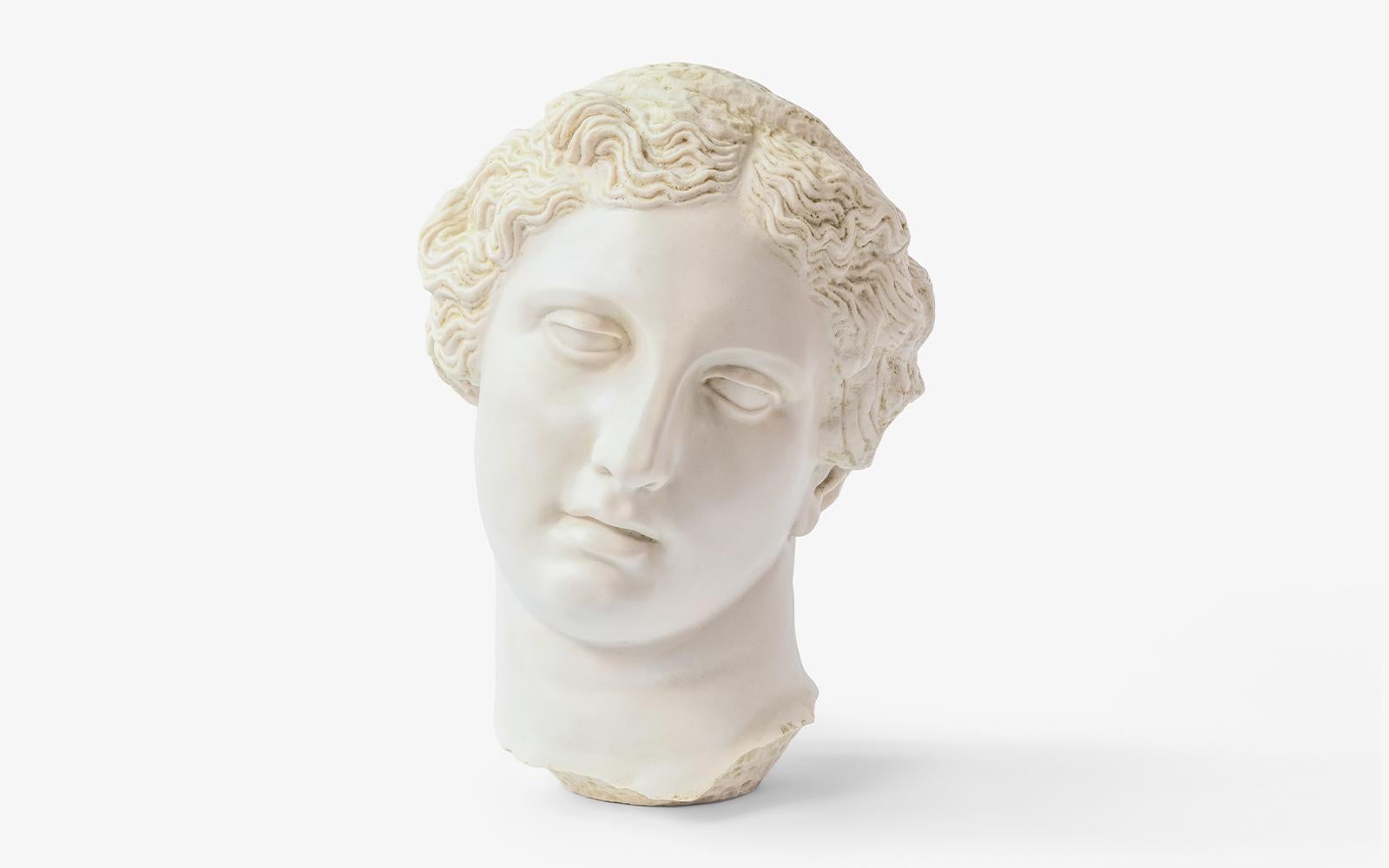Apollon Bust sculpture by Lagu.
Designed by Ufuk Ceylan.
Dimensions: W 44 x D 35 x H 58 cm.
Materials: Statuary Marble, Cast.

Apollo is known as the god of music, art, the sun, fire and poetry in Greek mythology. He also possessed the ability