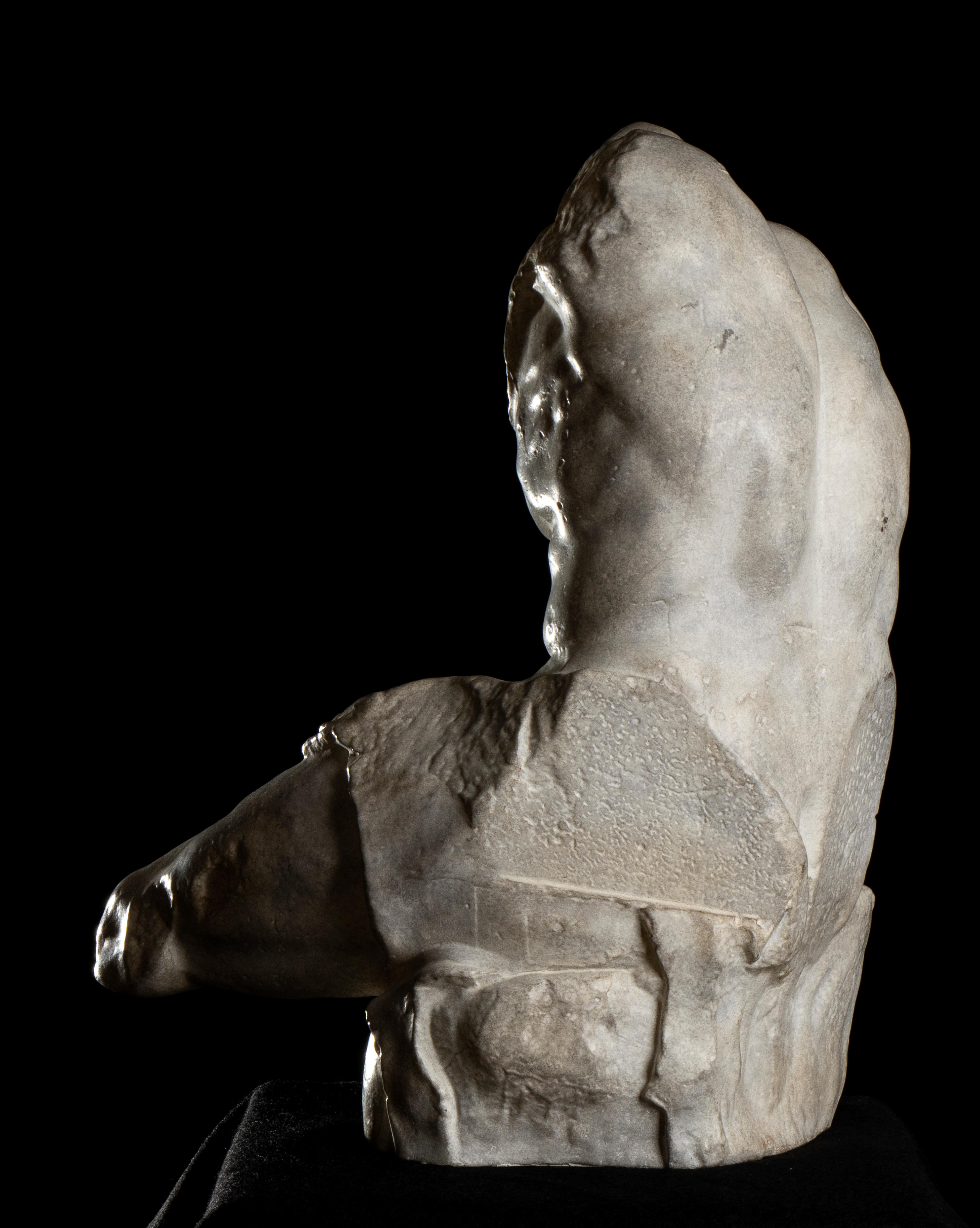 A grand tour style sculpture, scale size of the Belvedere Torso, the famous  fragmentary marble statue of a male nude, by 