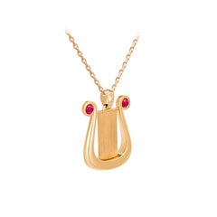 Apollo’s Lyre Pendant, 18-carat pink gold, rubies and diamonds