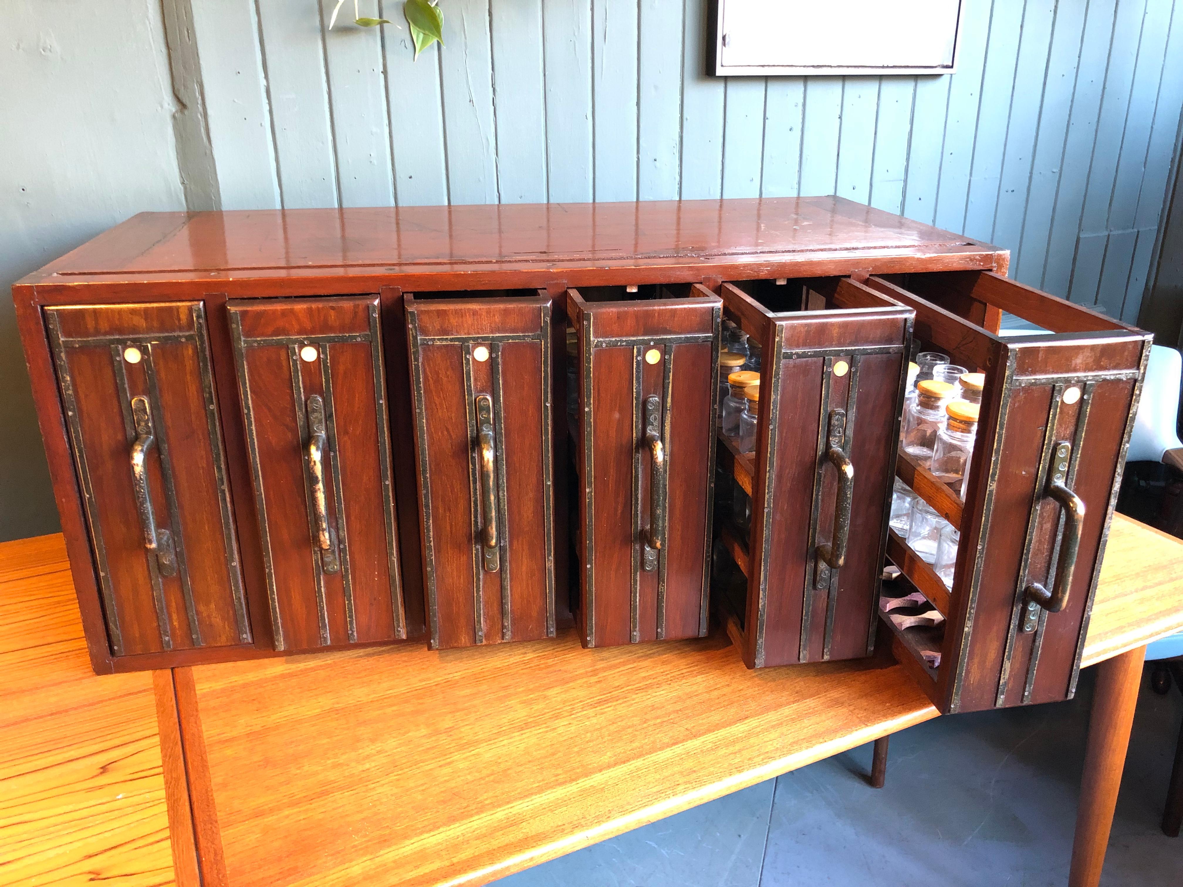 Apothecary Cabinet, Early 20th Century, Vertical Drawers with 113 Glass Bottles 6