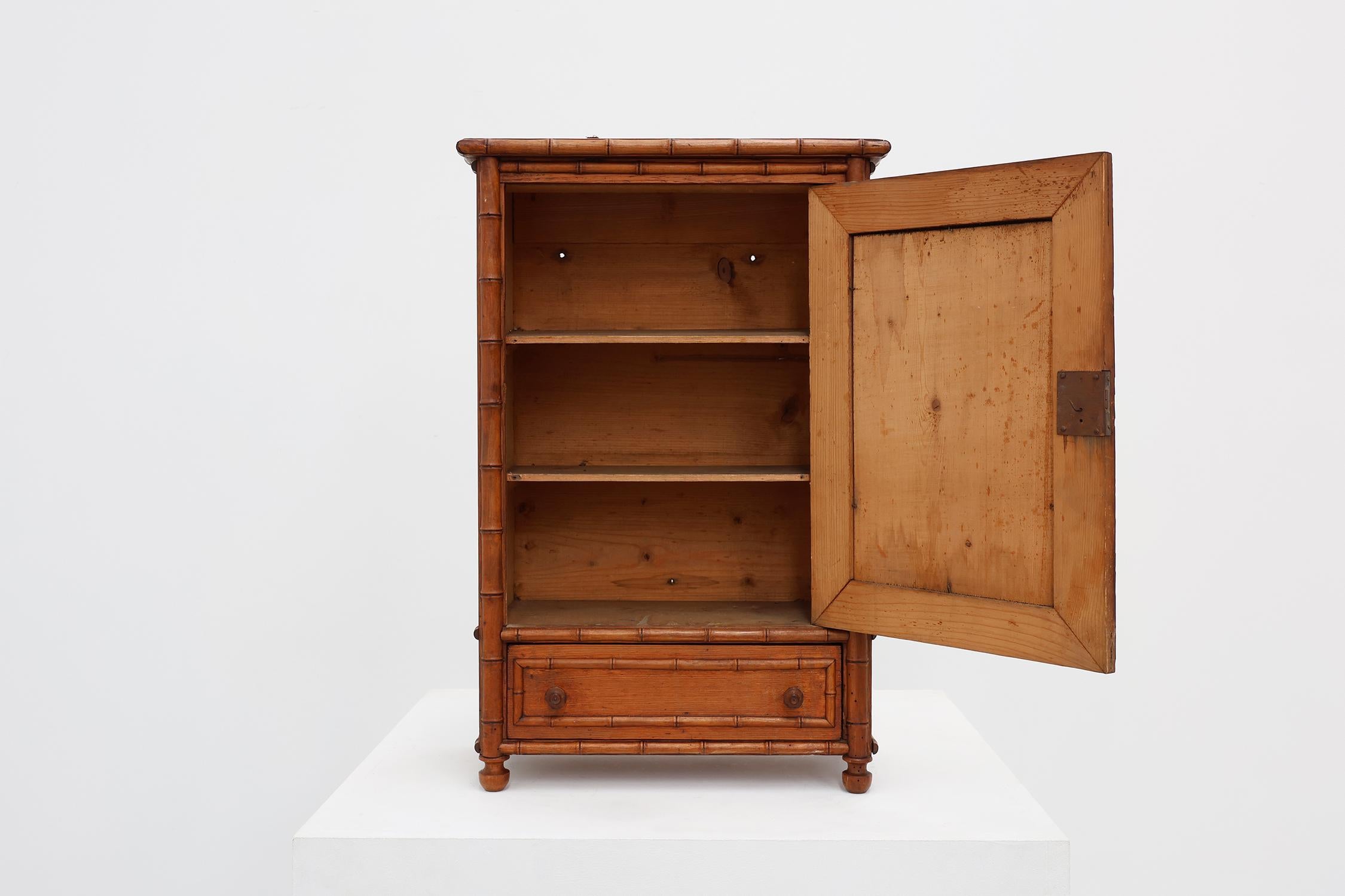 Mirror Apothecary cabinet in faux bamboo with mirror and drawer, France 1900s For Sale