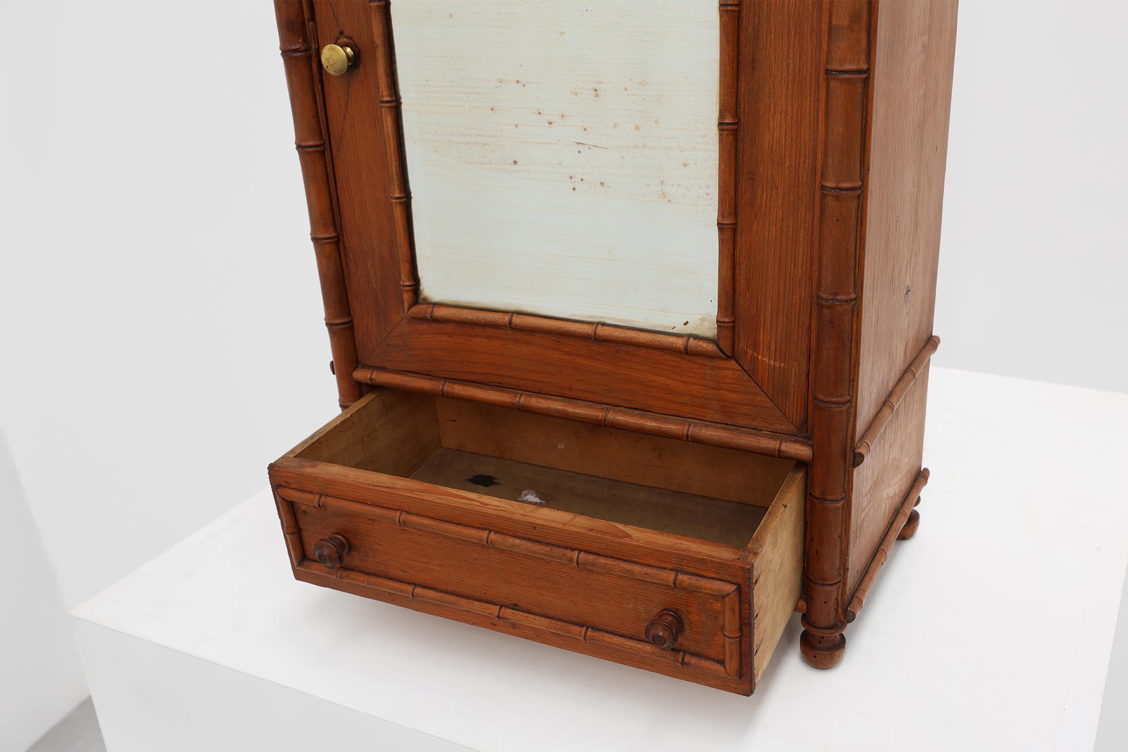 Apothecary cabinet in faux bamboo with mirror and drawer, France 1900s For Sale 1