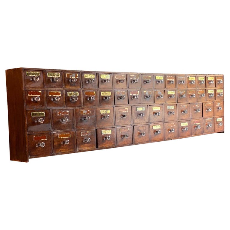 Antique Apothecary chest of drawers chemist pharmacy Victorian circa 1870

A stunning and extremely large Victorian Apothecary Chemist of drawers or cabinet comprising of 54 drawers, extremely rare to find a set this large and still in tact. The