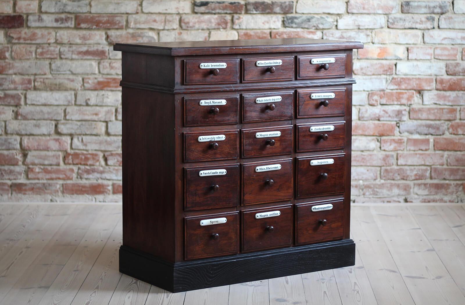 This apothecary chest of drawers was made around early 20th century. It is made of oakwood and has been carefully renovated, preserving original patina and traces of time. All surfaces have been cleaned and protected with natural wax. In addition,