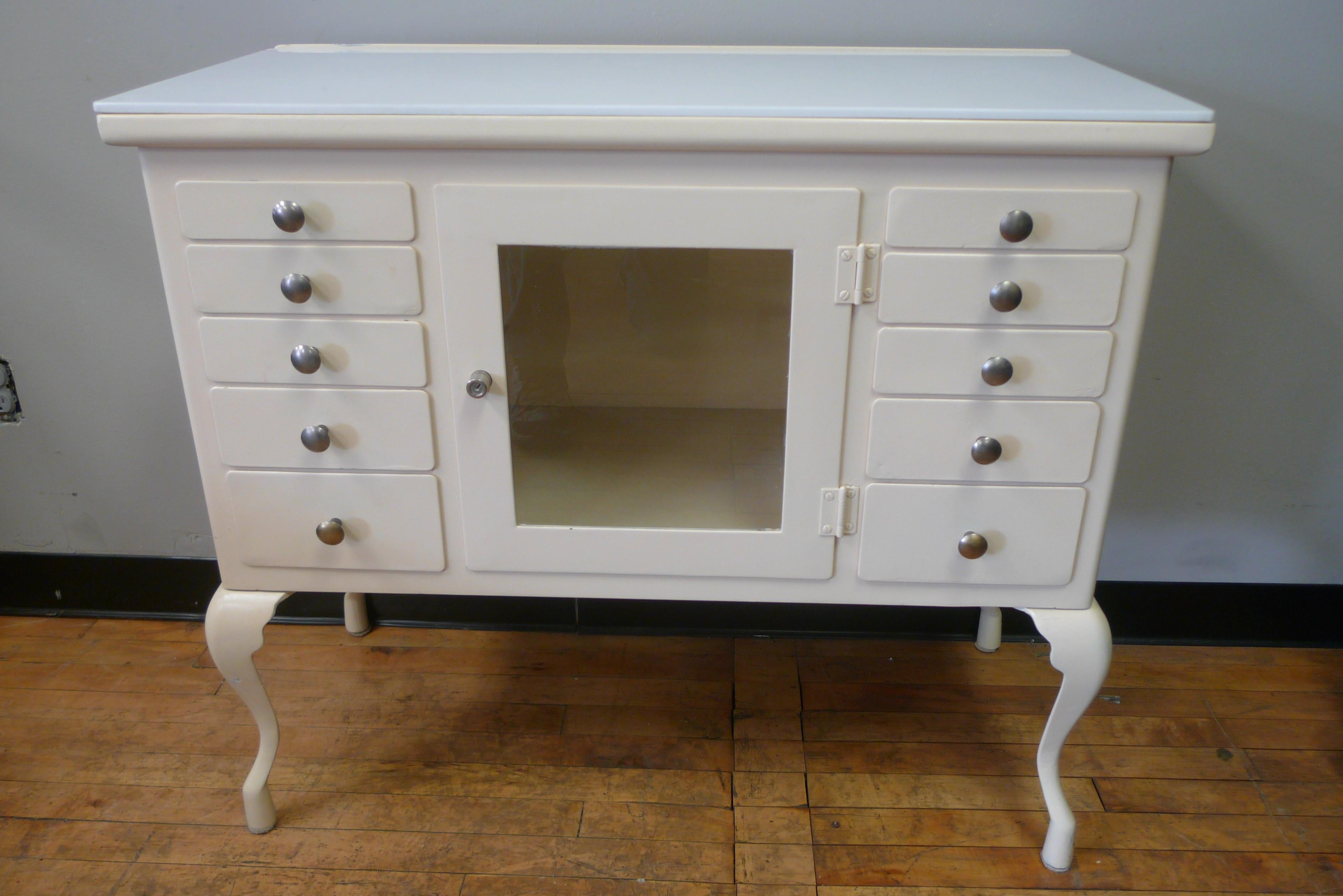 Industrial Apothecary Medical Cabinet circa 1910 cabriole legs, milk glass top, refinished