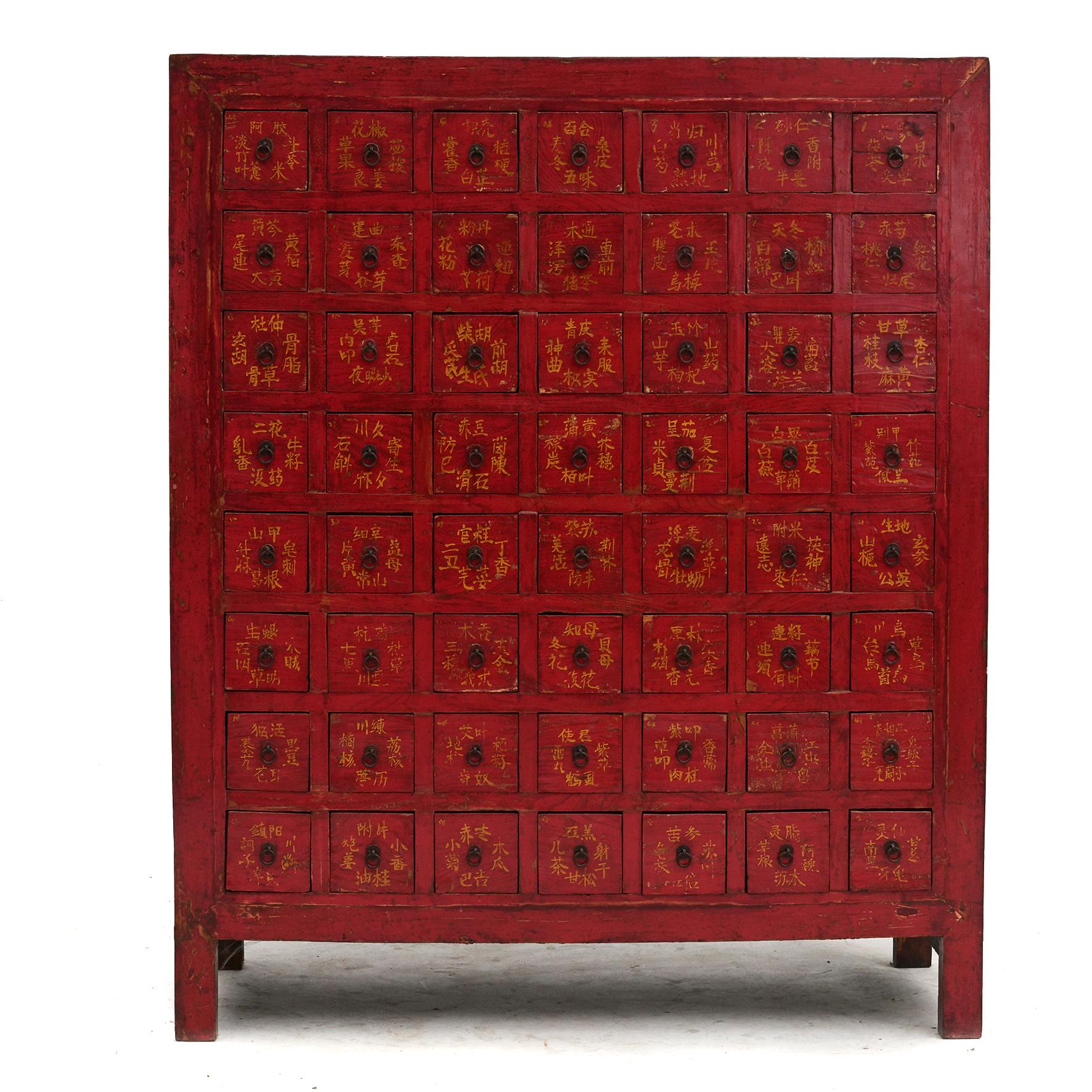 A Chinese Qing Dynasty apothecary / pharmacy medicine chest in original red lacquer.
56 drawers with hand written Chinese calligraphy in yellow lacquer. 
These were used to store and organise Chinese herbs and the drawers were labeled according to