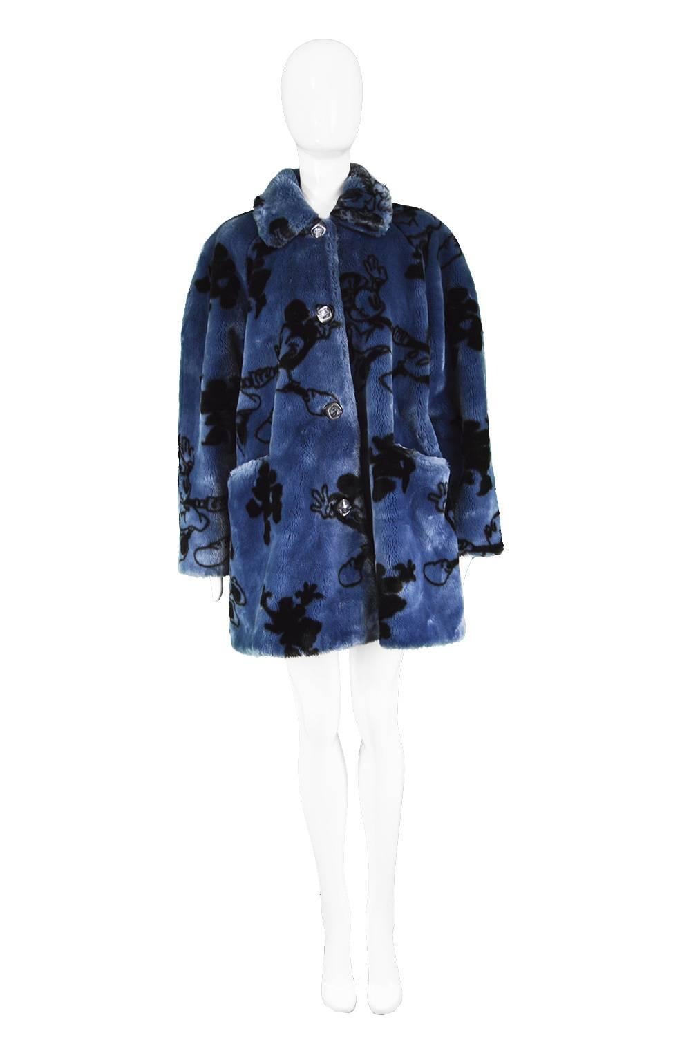 Apparence Paris Mickey & Minnie Mouse Blue Faux Fur Vintage Coat, 1990s

Estimated Size: women's Medium to Large but this gives the intended oversized / swing fit. Please check measurements. 
Bust - 48” / 122cm 
Waist - Free
Length (Shoulder to Hem)