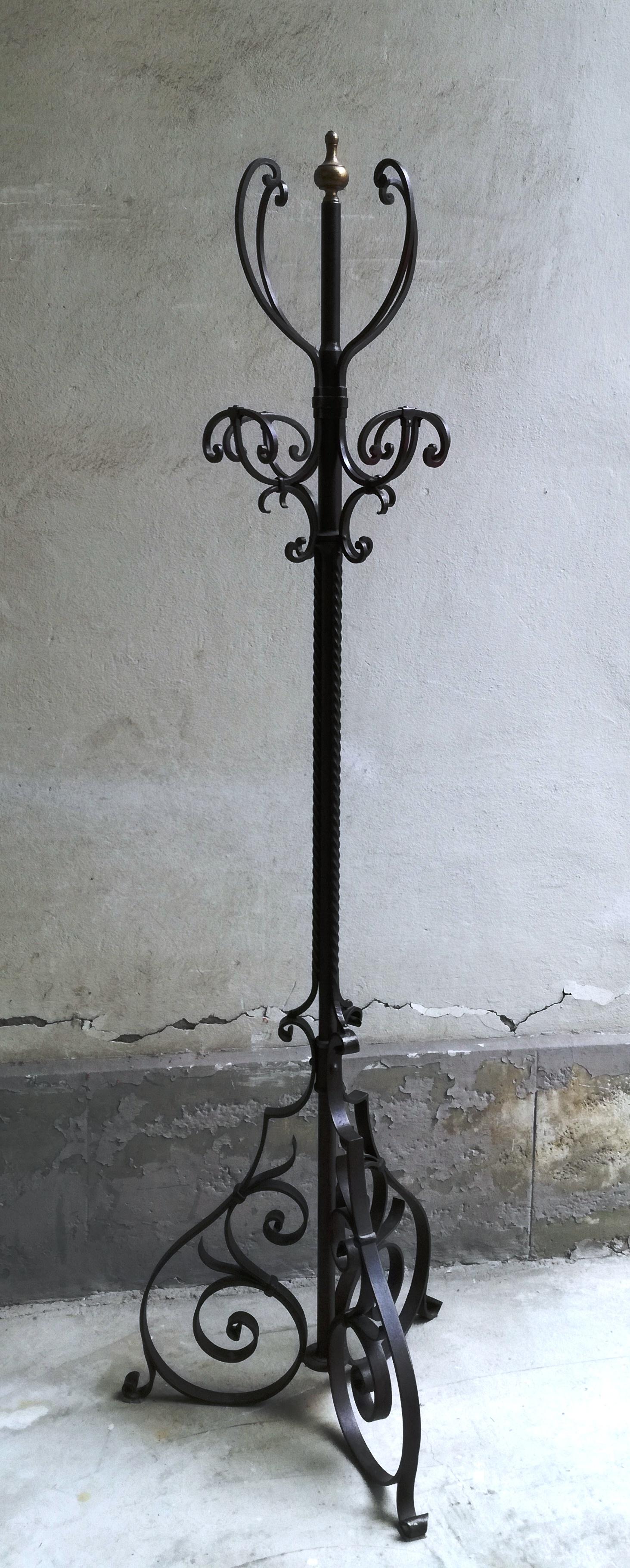 wrought iron coat stand, turn of the century. conceived and produced by skilled artisan blacksmith in the 1920s/30s. all handmade in the forge. very detailed. stable and very sturdy. weighs almost 30 kg.