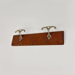 Italian antique wooden wall coat hanger with two metal hooks, 1930s