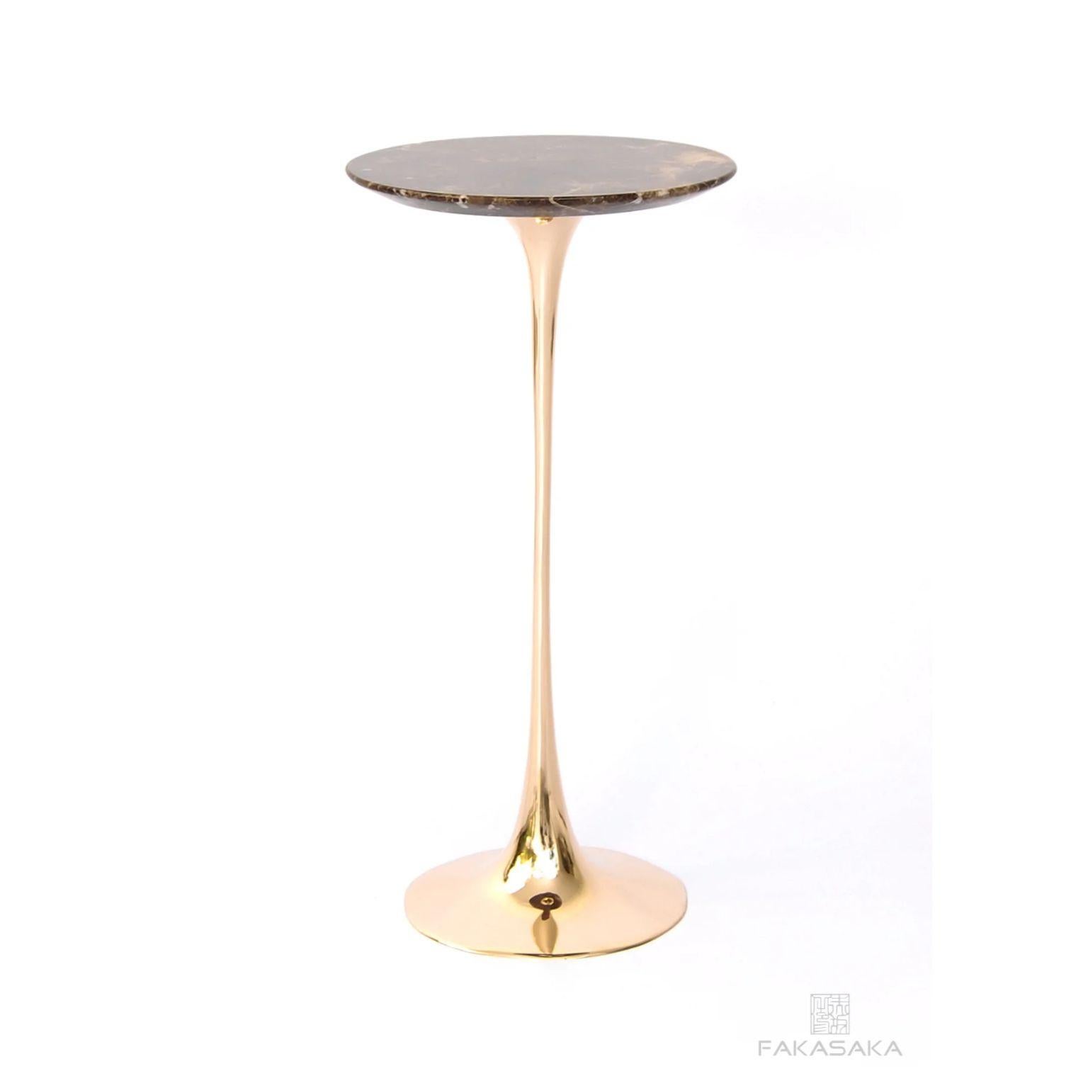 Apple drink table with Marrom Imperial marble top by Fakasaka Design.
Dimensions: W 30 cm D 30 cm H 61 cm.
Materials: polished bronze base, Marrom Imperial marble top.
 
Also available in different table top materials:
Nero Marquina Marble